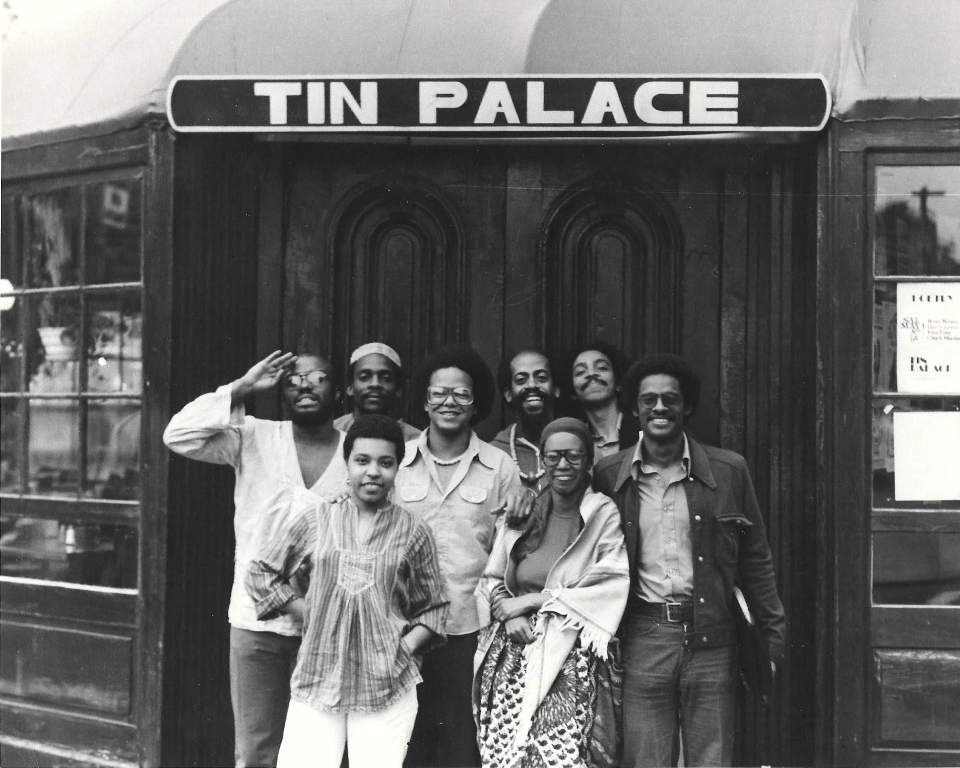  OUTSIDE THE TIN PALACE, 1976 BY AMOS RICE, WITH STANLEY CROUCH, ALICE NORRIS, DAVID MURRAY, CARLOS FIGUEROA, PATRICIA SPEARS JONES, PHILLIP WILSON, VICTOR ROSA AND CHARLES "BOBO" SHAW 