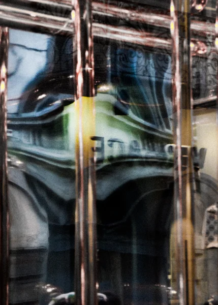 Milan. Dior/Versace Window Reflection
