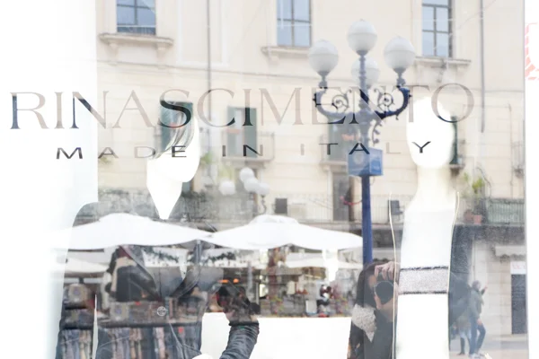 Verona. Rina Scimento/Piazza Erbe Window Reflection