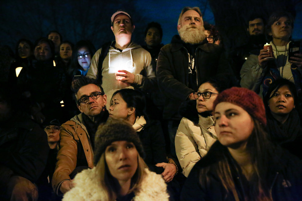  Mourners gather at a vigil for the victims of the fatal warehouse fire during a vigil at Lake Merritt Pergola in Oakland, California, U.S. December 5, 2016.&nbsp; 