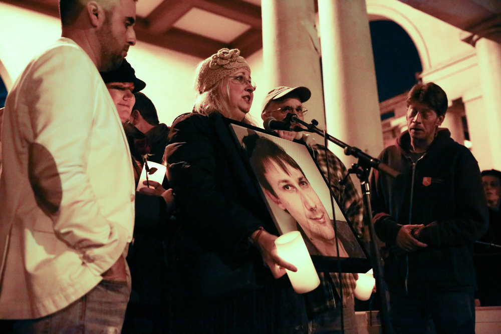  A family shares stories of their son who was one of the 36 people who died in the Oakland Fire during a vigil at Lake Merritt Pergola in Oakland, California, U.S. December 5, 2016. 