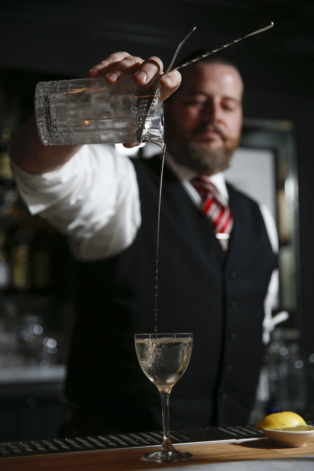  Brandon Clements bartender with Saratoga, an American restaurant with a full bar, makes a drink. The restaurant opens next week located at 1000 Larkin Street in San Francisco, Calif. on Thursday, November 3, 2016.    