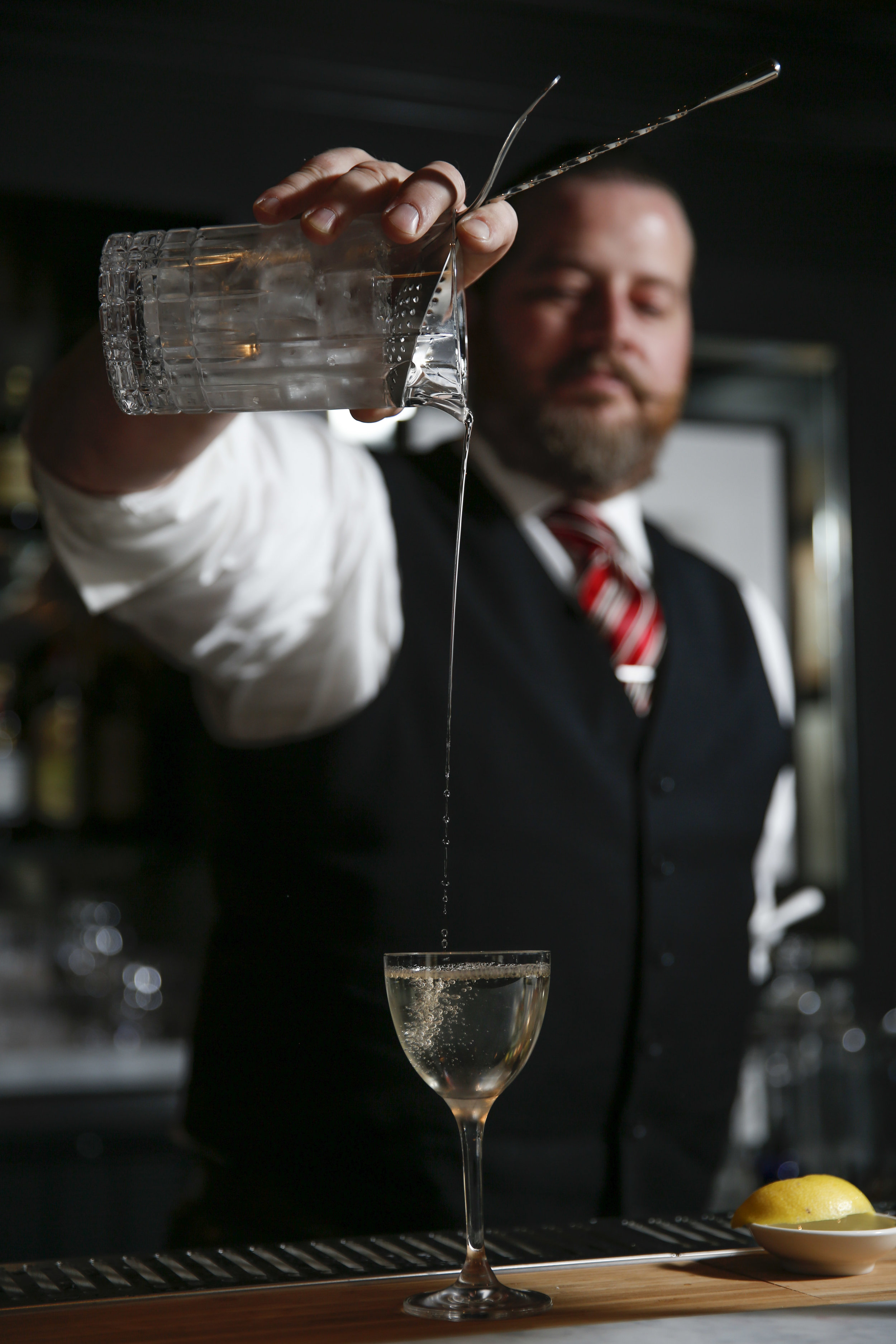 Brandon Clements bartender with Saratoga, an American restaurant with a full bar, makes a drink. The restaurant opens next week located at 1000 Larkin Street in San Francisco, Calif. on Thursday, November 3, 2016.