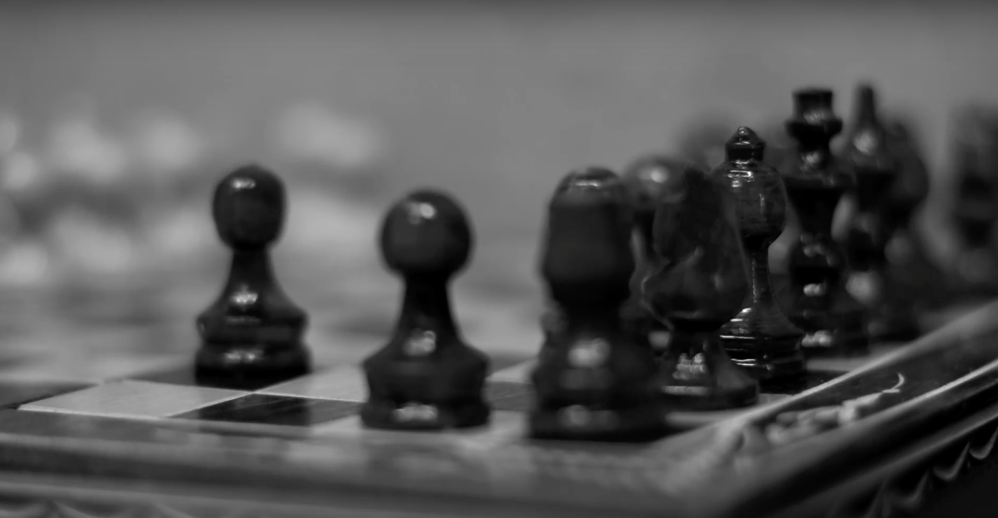David Scrieciu - Checkmate A prisoner must win a game of chess in order to survive.