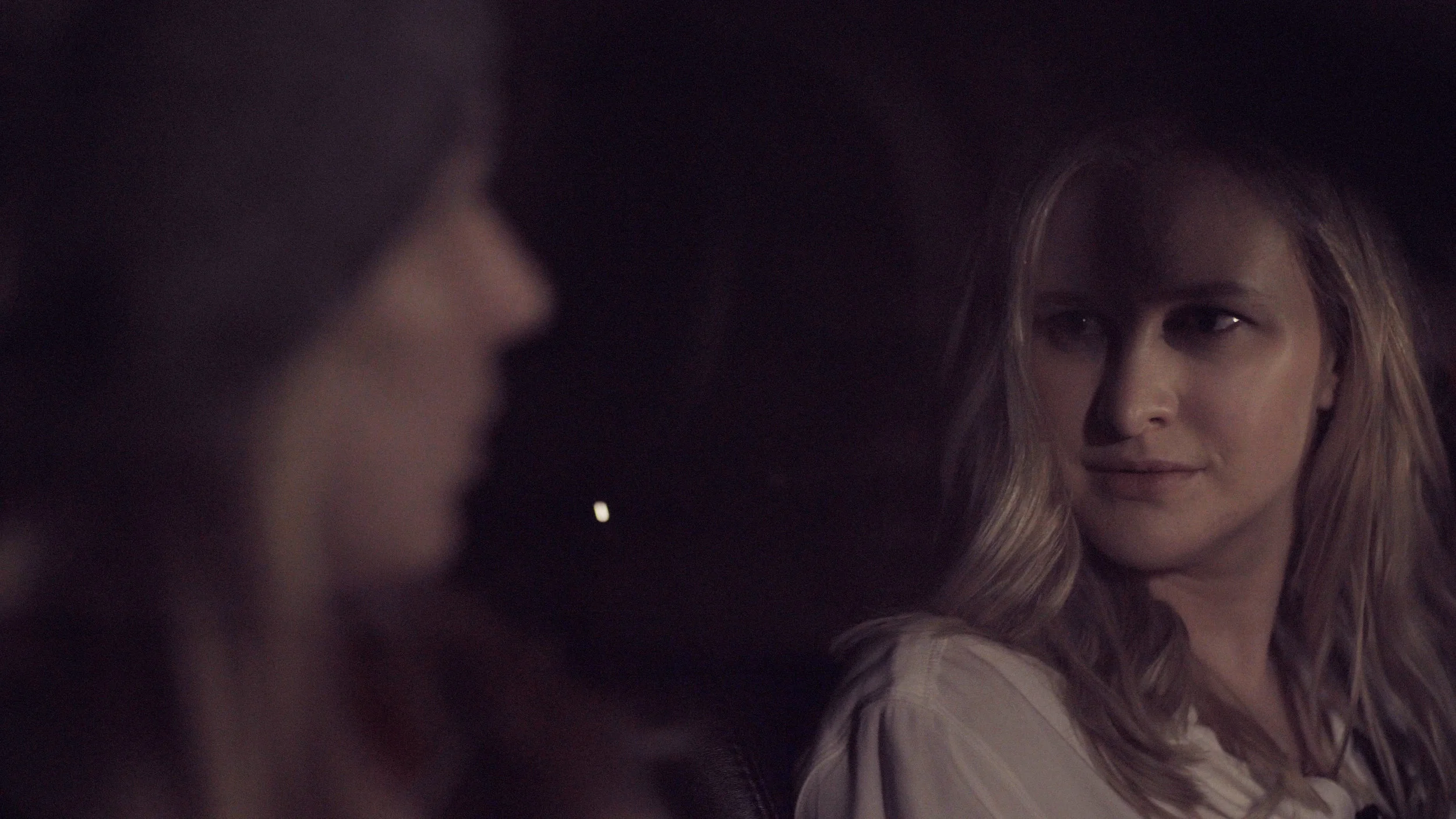 Claudia Carino - The Dark Side A hitchhiker accepts a ride from a woman looking for her next adventure.