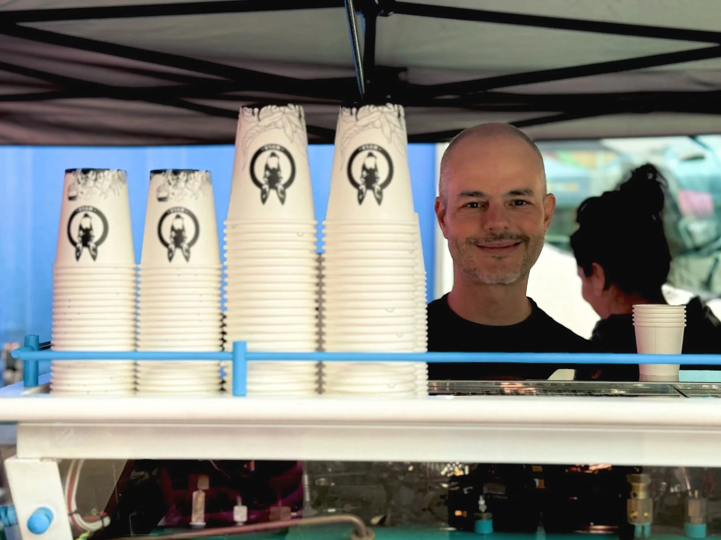 Nico smiling behind the espresso machine at Ramsgate Markets