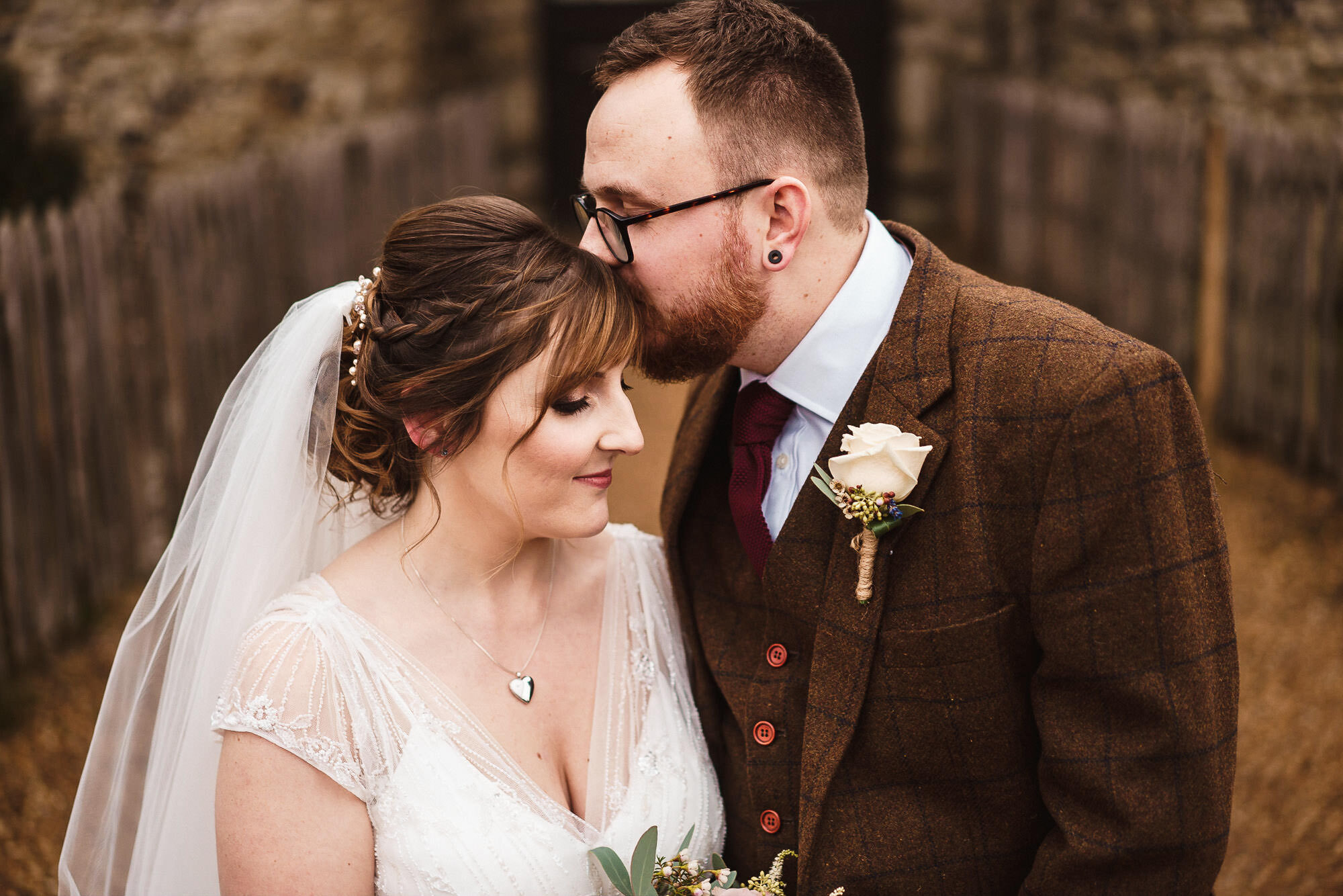 bride and groom portrait outside castle