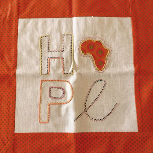 Shweshwe hope cushion cover