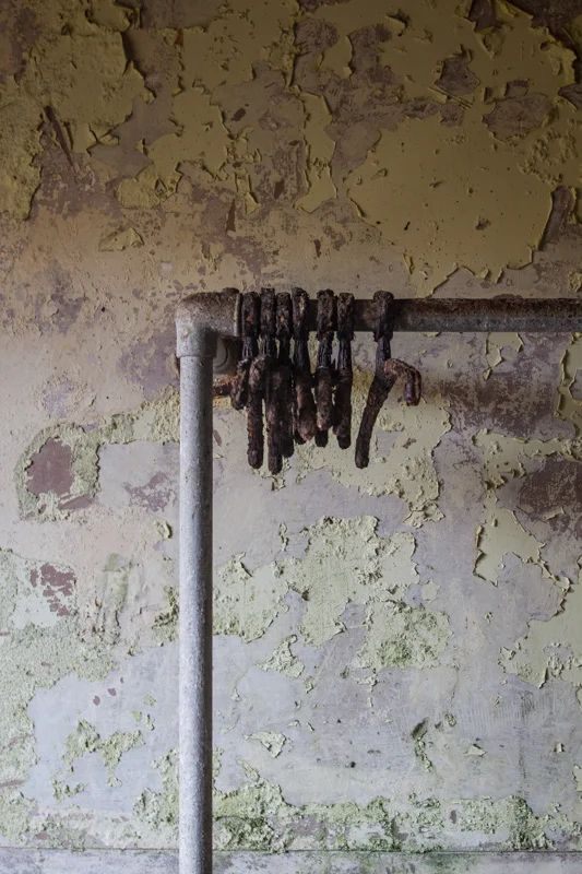 Rusted hangars in abandoned listening post.