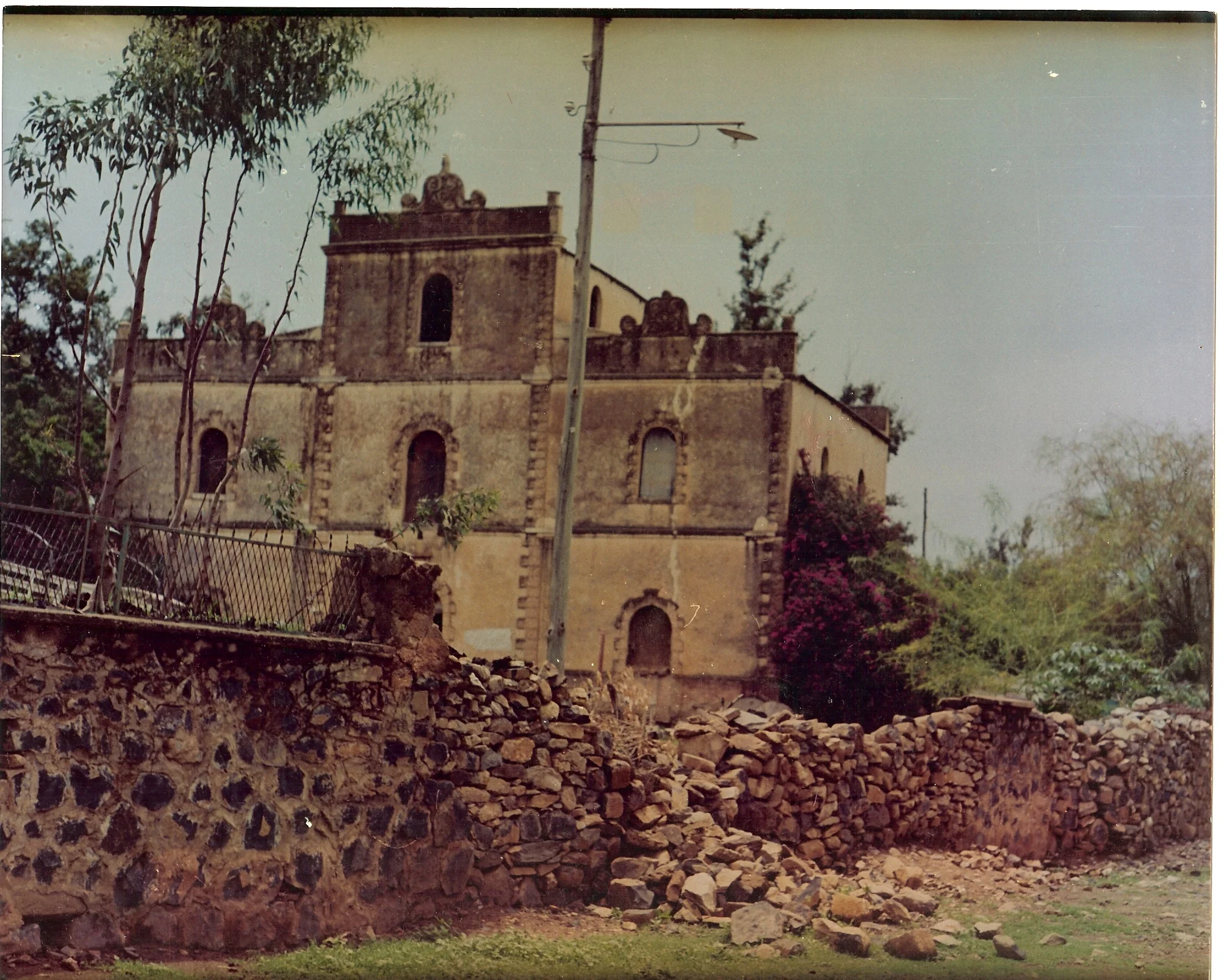 What was once a stately building had been ravaged by years of neglect and war.