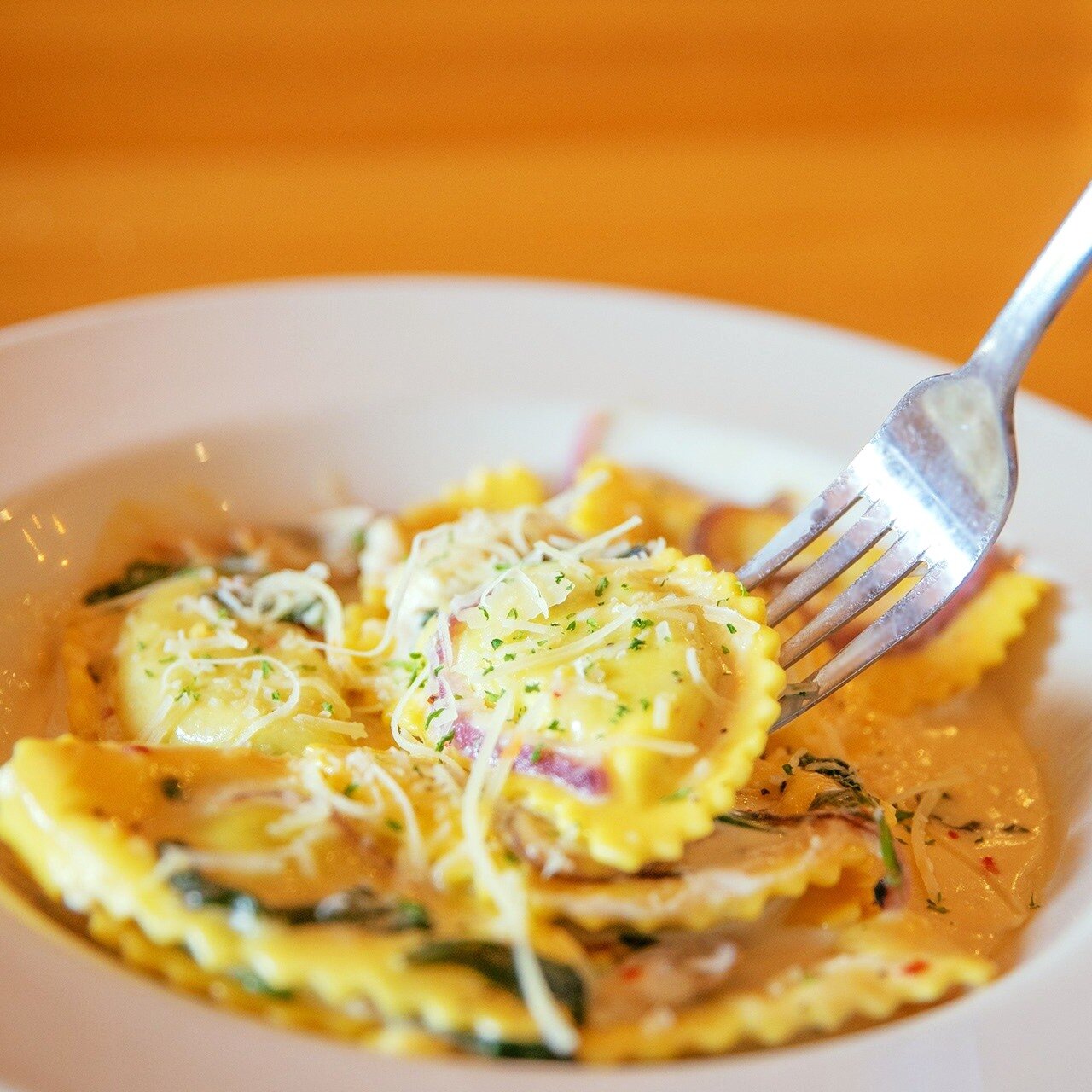 ✨ Pasta with personality! Our Spinach &amp; Kale Ravioli offers an ensemble of flavors - tender greens, rich cheeses, and a symphony of mushrooms and shallots in an exquisite white wine cream sauce. Tag your pasta-loving pals or share your favorite N