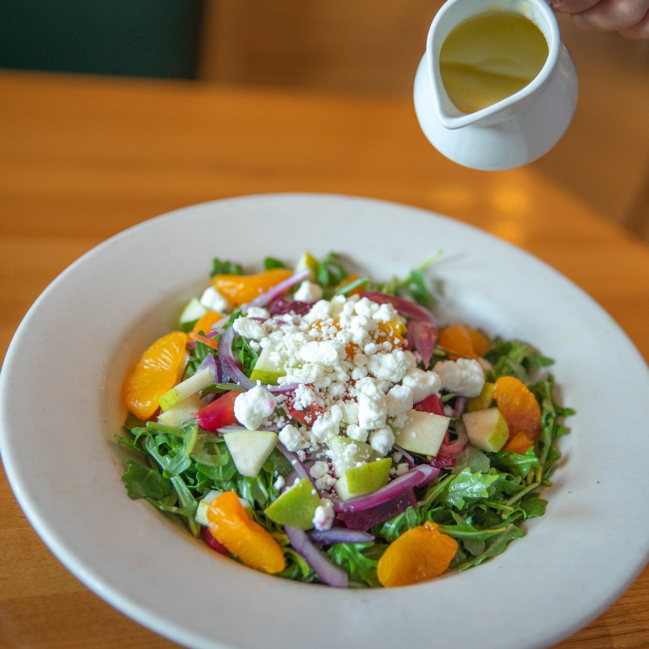 Feeling beet down? Let our Arugula Beet Salad lift your spirits! Packed with fresh arugula, vibrant beets, zesty mandarin oranges, a sprinkle of goat cheese, and delicious red wine vinaigrette.

#NapaFlats #NapaFlatsWoodFiredKitchen #ArugulaBeetSalad