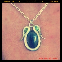 egyptian uterus pendant ;).jpg