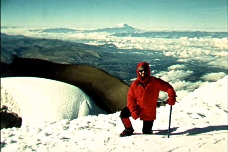 The summit of Cotopaxi. On the horizon in the distance is Chimborazo.