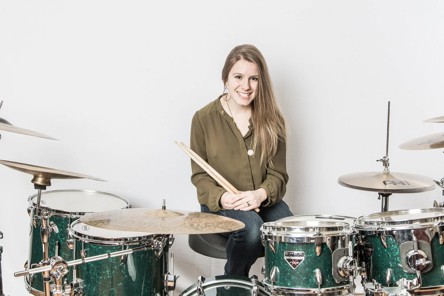 Hannah Stallings is a drum set player, percussionist, and educator based out of Nashville, TN. She works as a freelance drum set player the live and studio settings, and instructs privately. As a 12-year-old, Hannah had no idea what instrument to play in the middle school band. She had been taking piano lessons since the ripe age of 4, but piano was not an option in concert band. One day, her dad asked her, “What’s your favorite song?” She proceeded to play Let’s Get Loud by Jennifer Lopez on the boombox, and when asked why, she replied, “I like the beat”. It was then obvious to Hannah’s dad; she should try percussion. Since then, Hannah has completed a Diploma in Music Performance from Grant MacEwan University in her hometown Edmonton, Canada in 2010, and a Bachelors in Music Education from Berklee College of Music in Boston, MA in 2014. She has performed, toured, and recorded internationally with a number of artists, notably CCM songwriter Ginny Owens, R&B/pop artists Marc Evan Diaz and Ashe, blues/Americana band Swingin Hammers, and Nashville’s premiere all-female country group Fading June. She also had appearances on ABC's Nashville , Season 4. Hannah also loves to teach, and she cherishes seeing her students develop musically and experience the joy of learning and growing as a musician. Hannah has had experience in the public school system as both a substitute teacher K-12 and a Special Education Teachers Assistant K-5, instructed drum set and directed performance groups at the School of Rock in Nashville, TN, and has taught drum set privately since 2009. She has recently begun managing David Spencer Music Group in-home music lessons studio, based in Brentwood, TN.