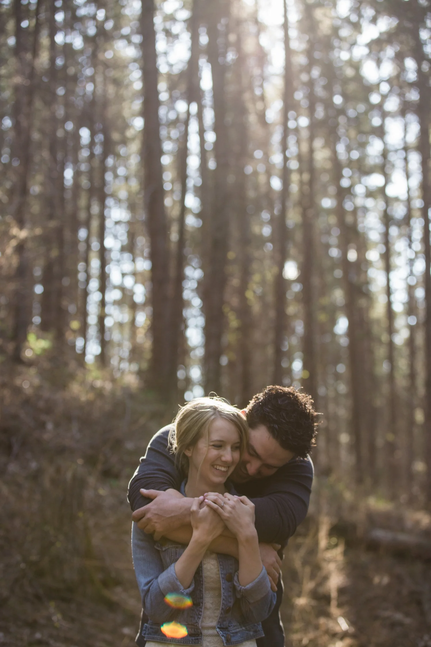 intimate engagement session in the forest