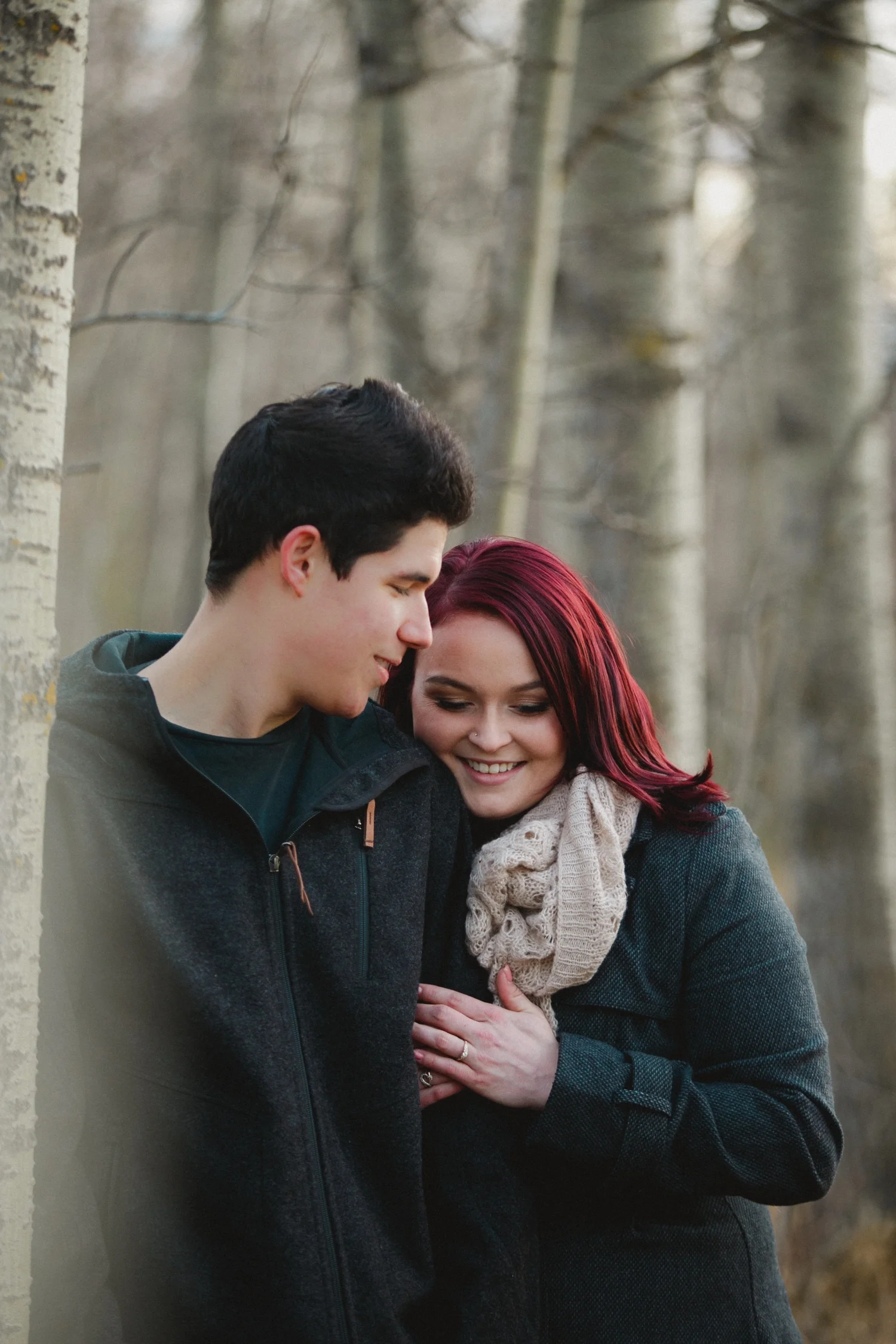 intimate engagement session in the forest