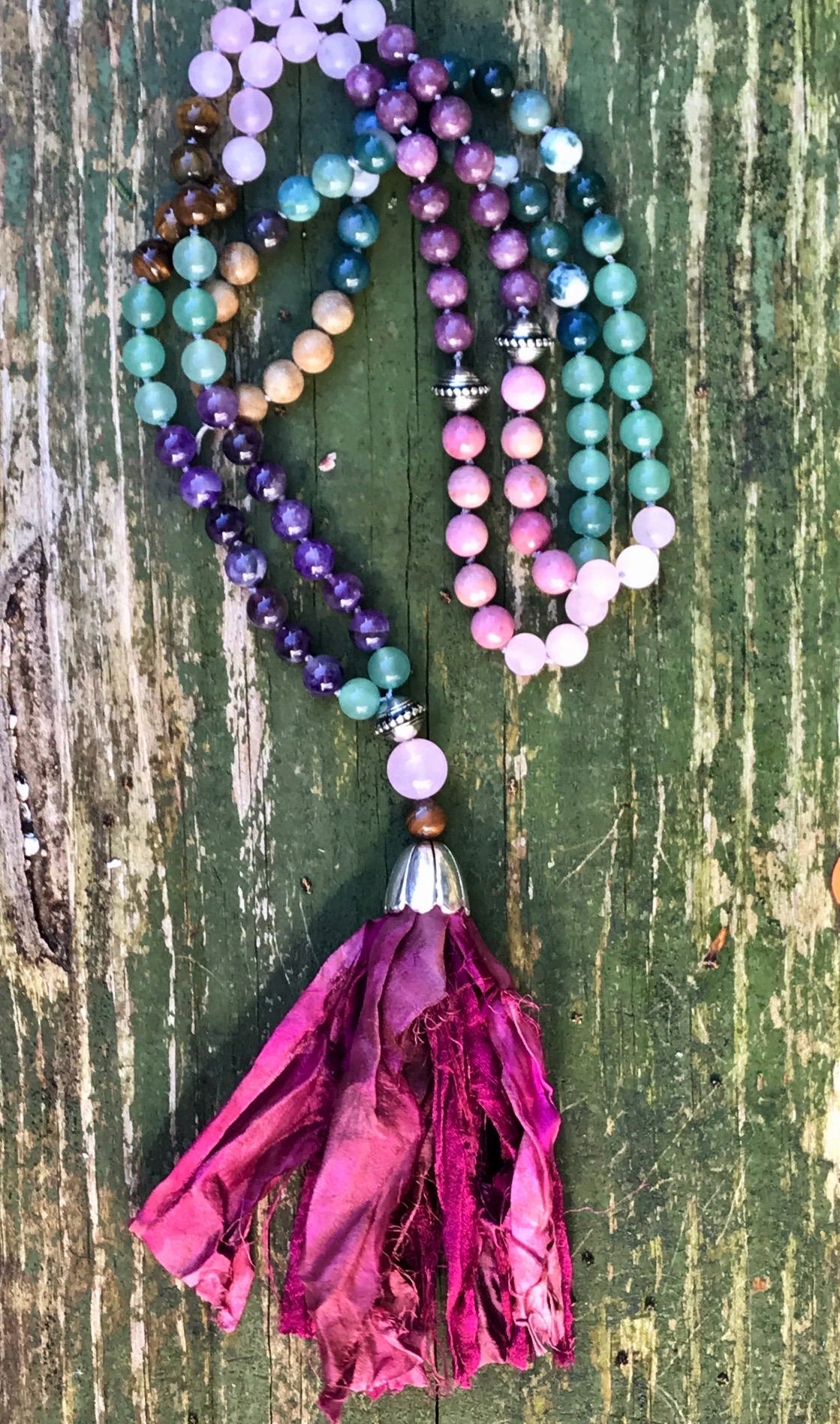 Mala with Sari Silk on green wood.jpg