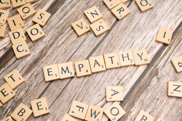 Scrabble tiles spelling empathy.