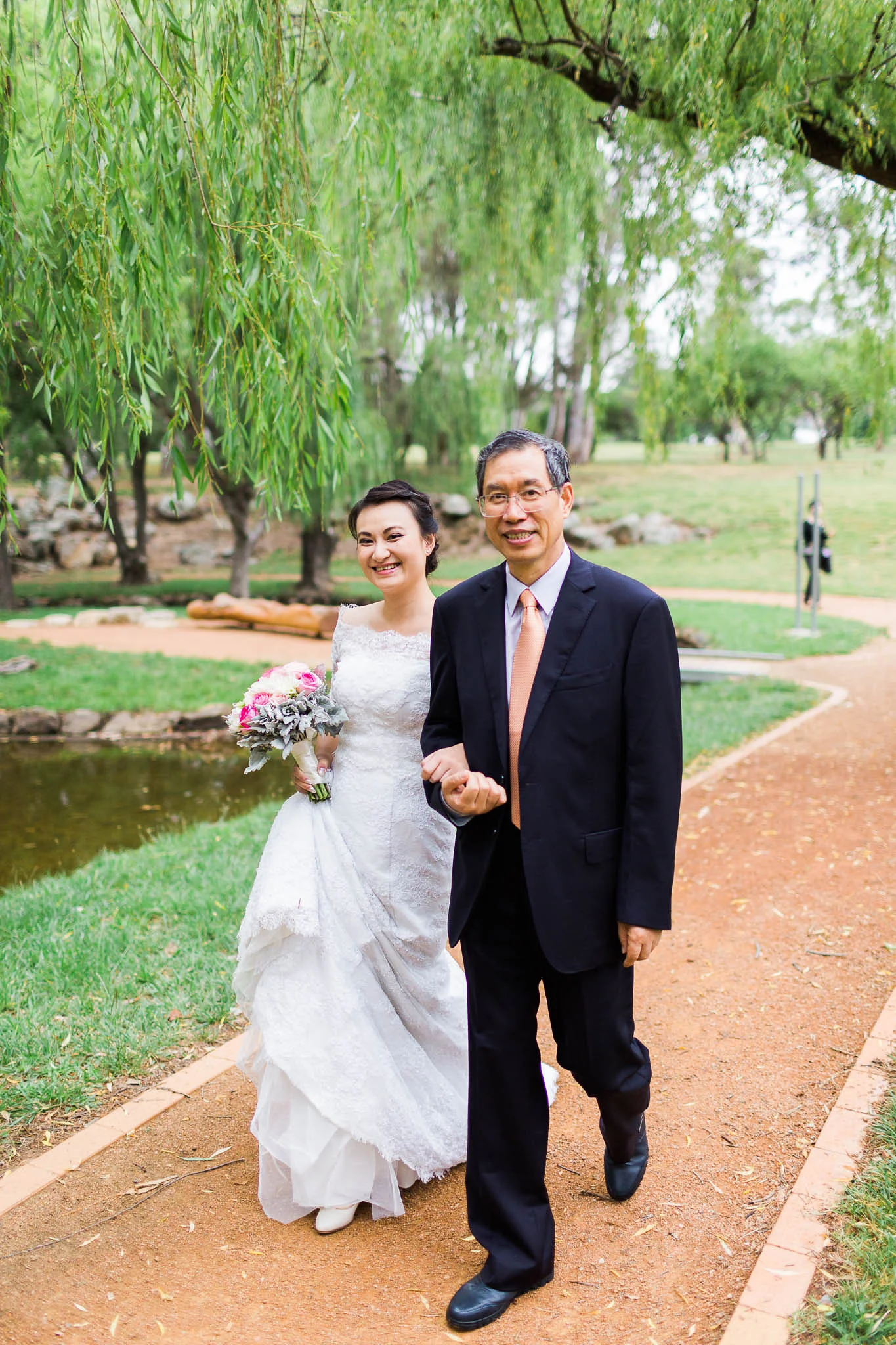 Bride and Father walking down the aisle to be married - Western Park Canberra Wedding Photography