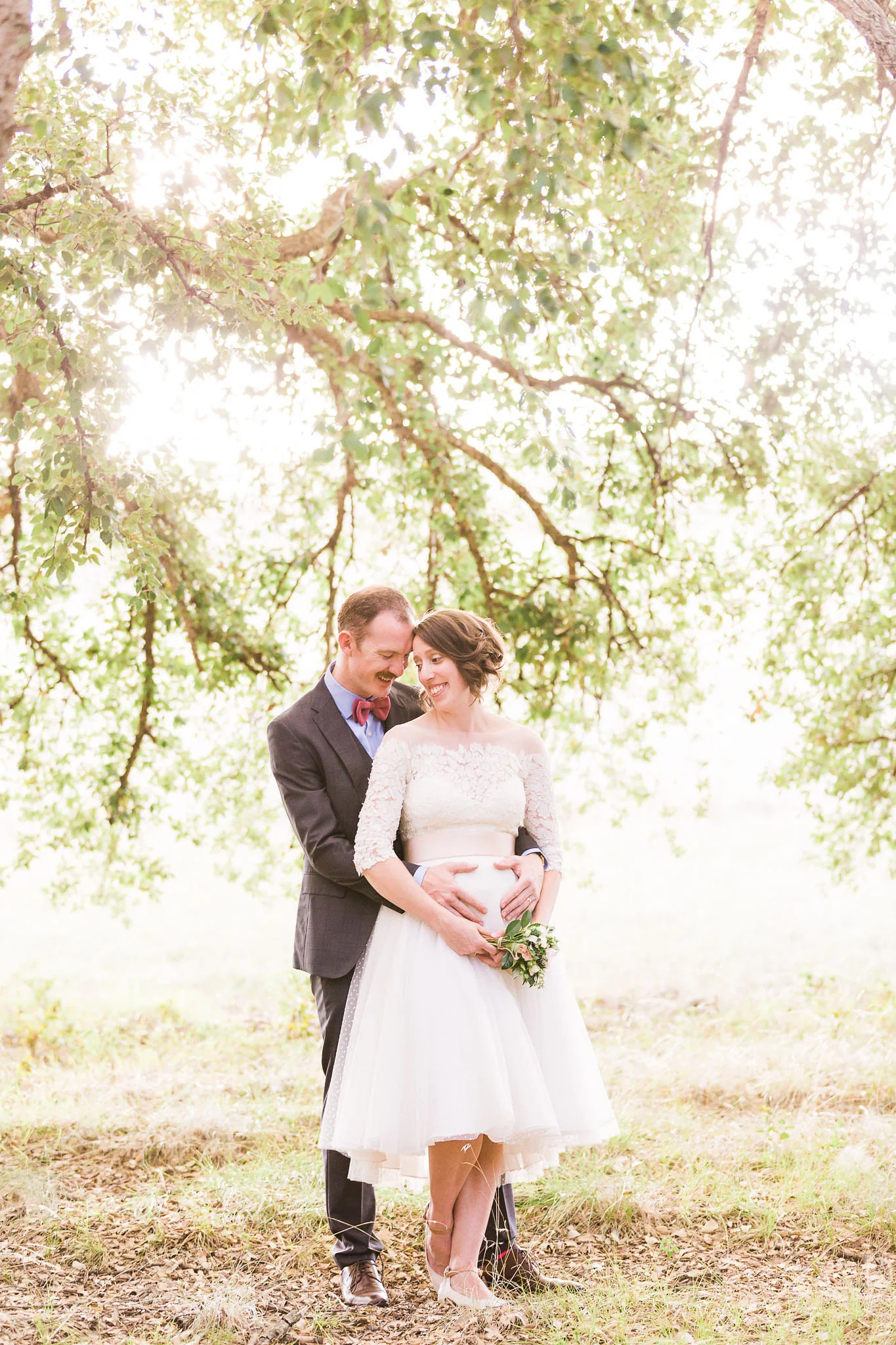 Newlyweds pose for wedding photos in the Cork Forrest, Canberra.