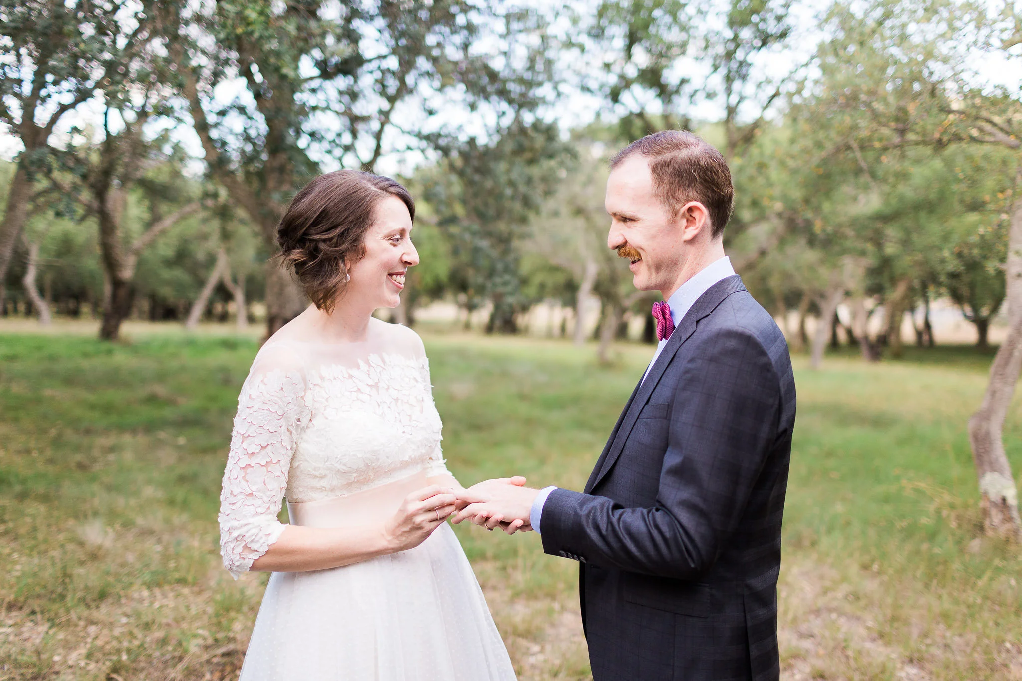 Bride and Groom exchanging rings at their surprise wedding ceremony in Canberra.