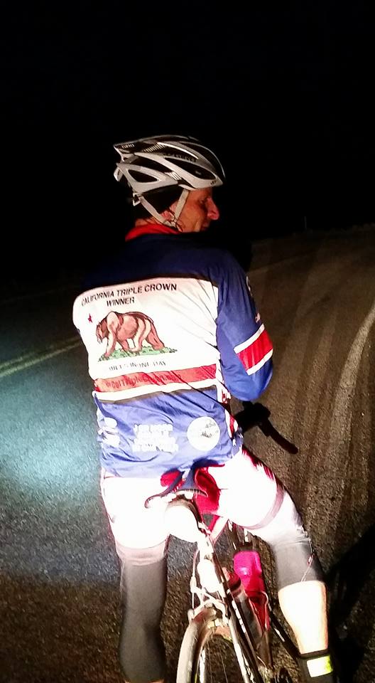 Brandon adjusts his gloves sometime around 4:00 am. It's brutally cold and dark, but he rides so fast. Photo by: Stacey Tinianov.