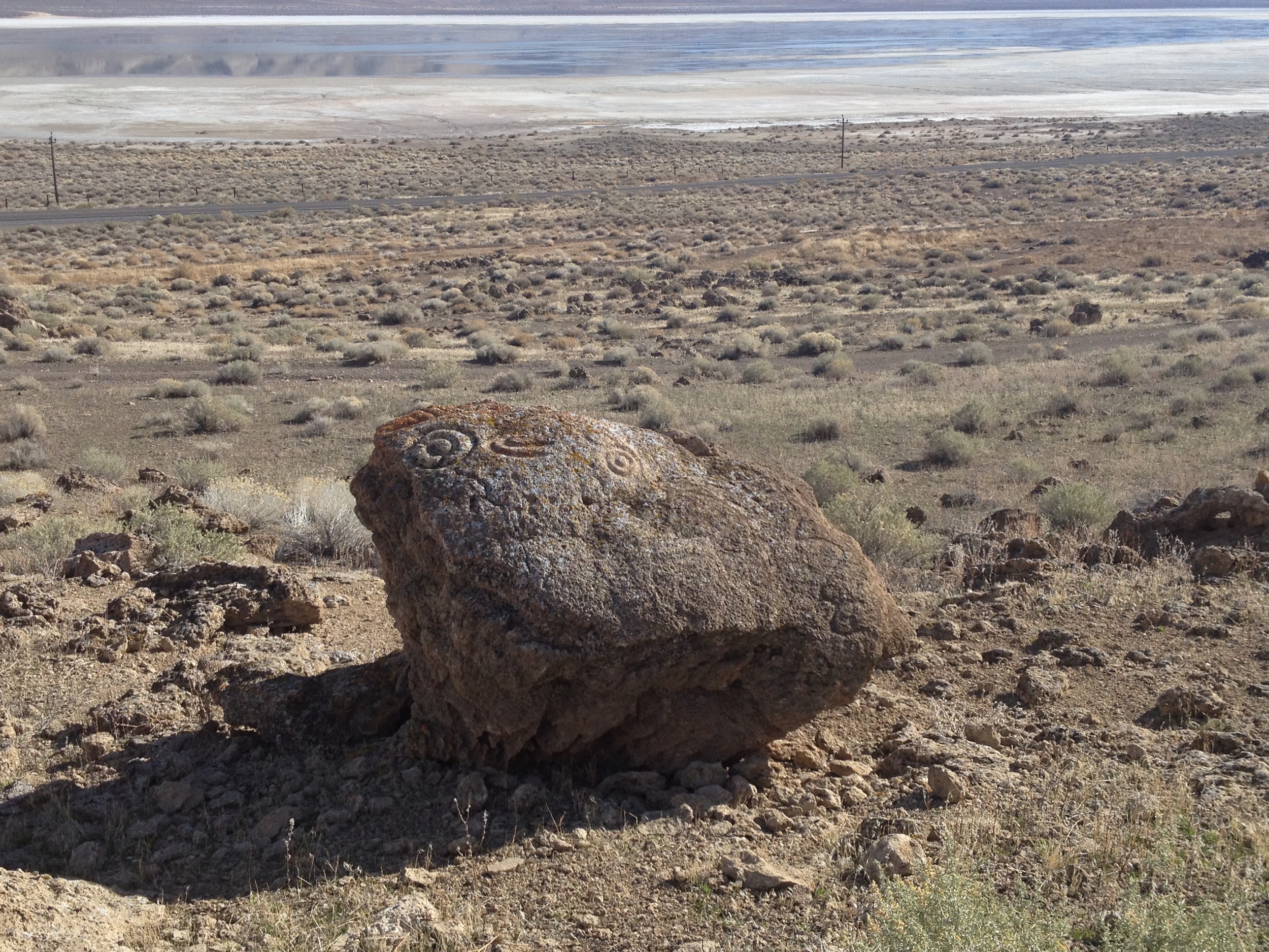 Petroglyphs en route to Black Rock overlook another dry lake bed. It's funny how desert was once an ocean.