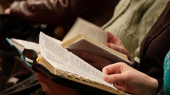 Flipping Through Bible At Church.jpg