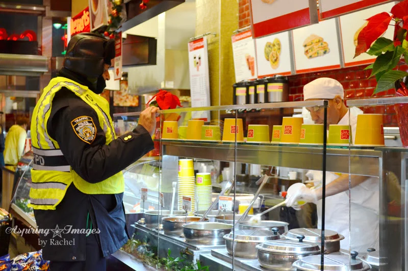 2010_Dec_NYC_Cop_Ordering_Food_small