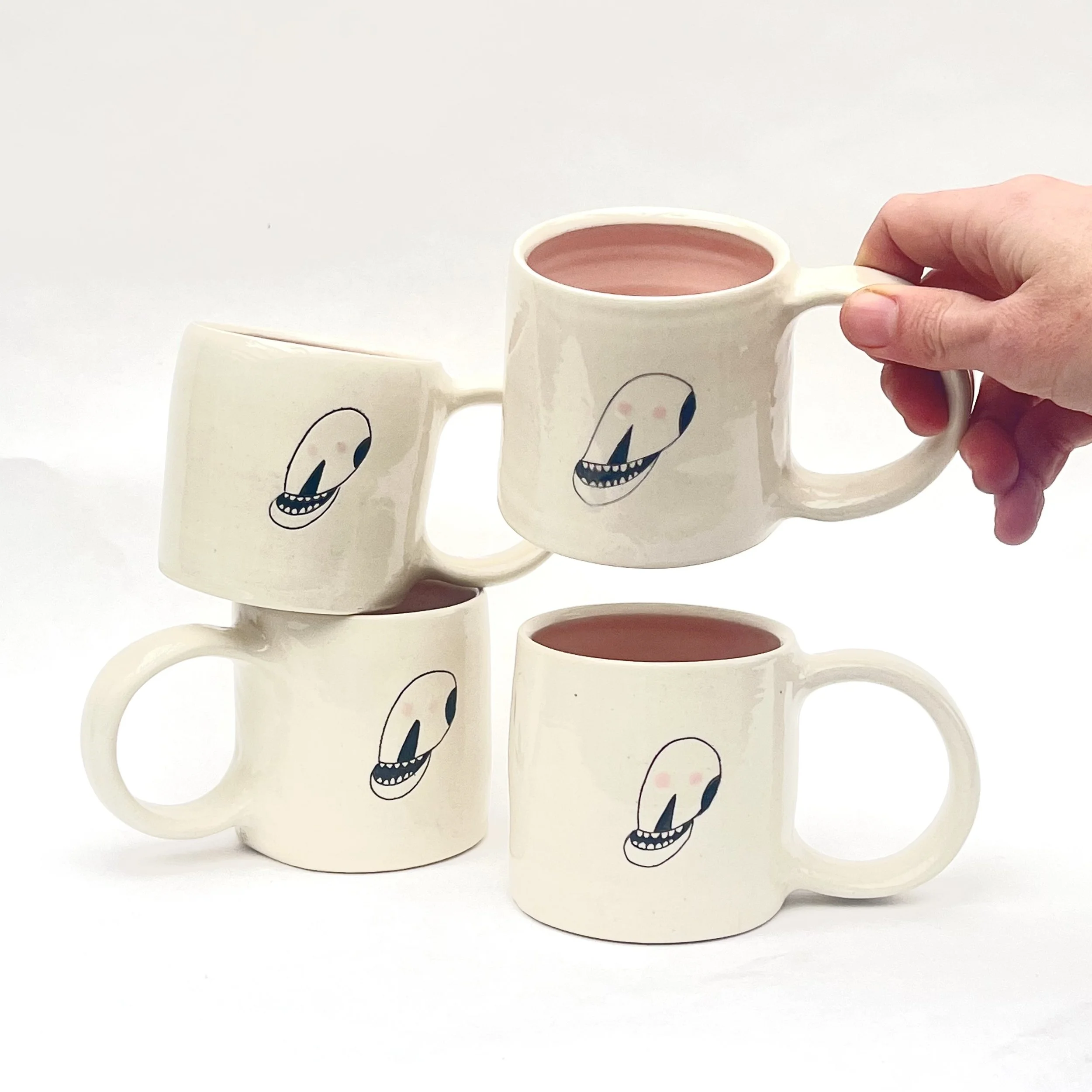 pinkskullmugquartethand.jpg