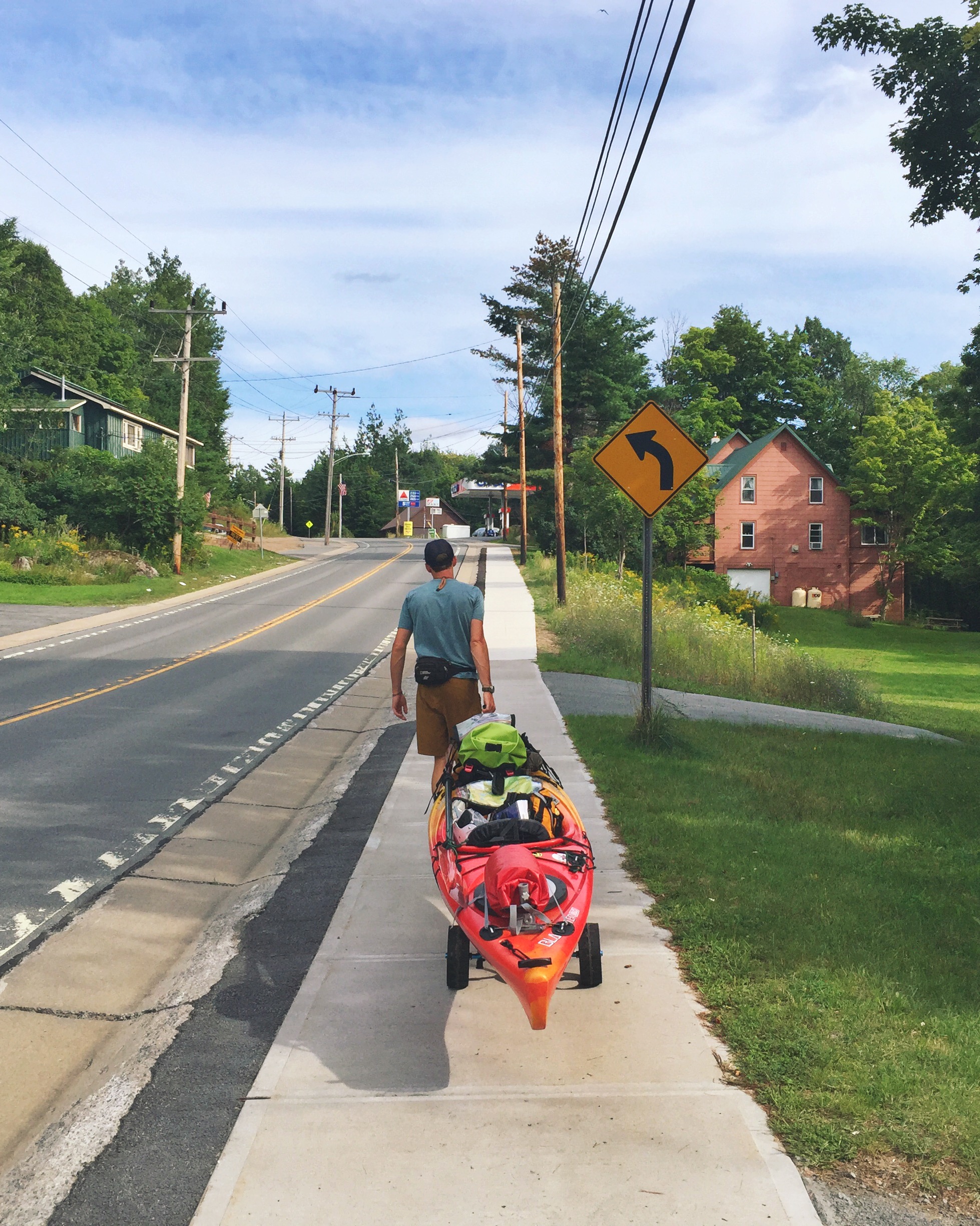 Carting our boats along Route 28 to Sixth Lake.
