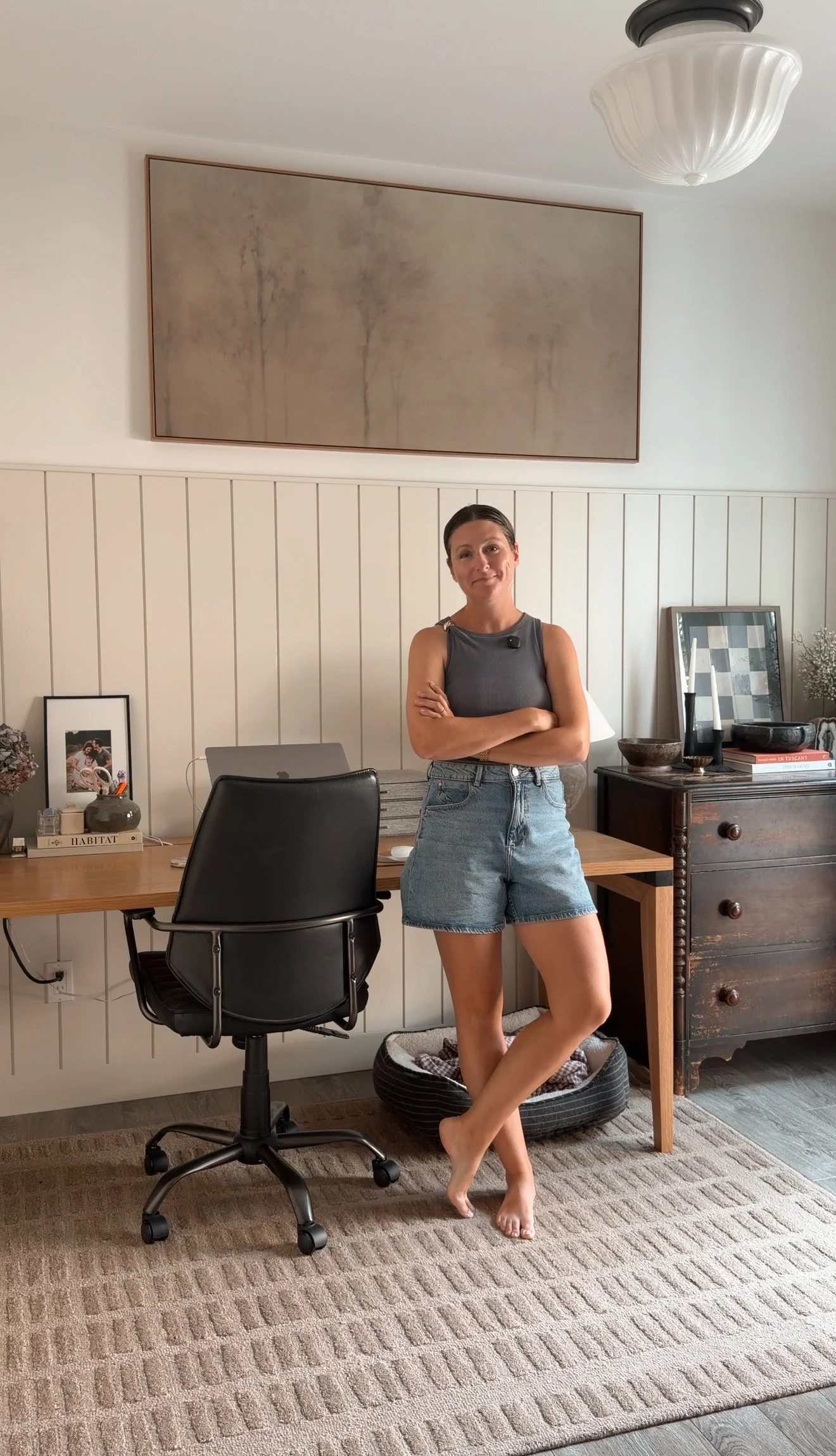 Large wall decor with oversized moody canvas art in a modern organic home office