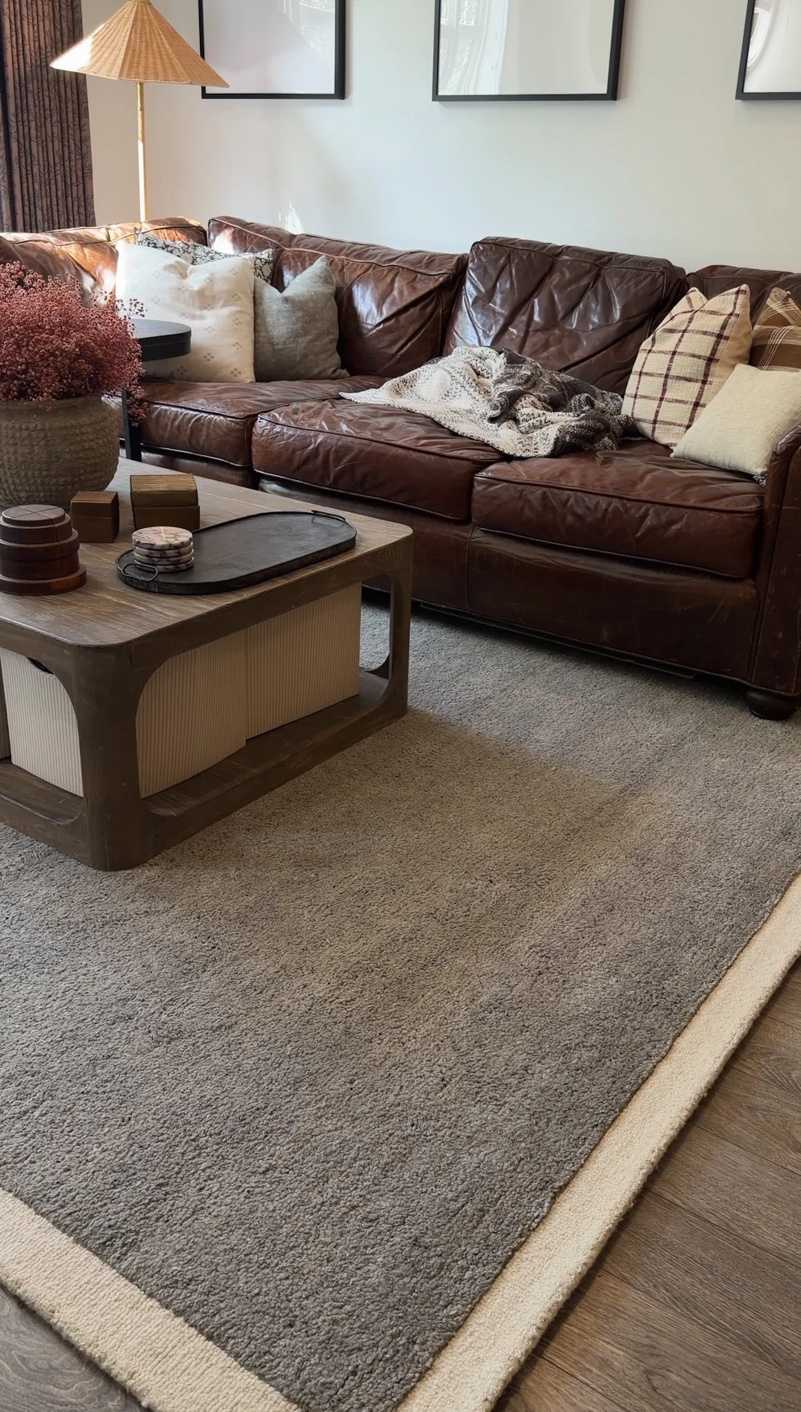 neutral wool blend rug in a organic modern living room