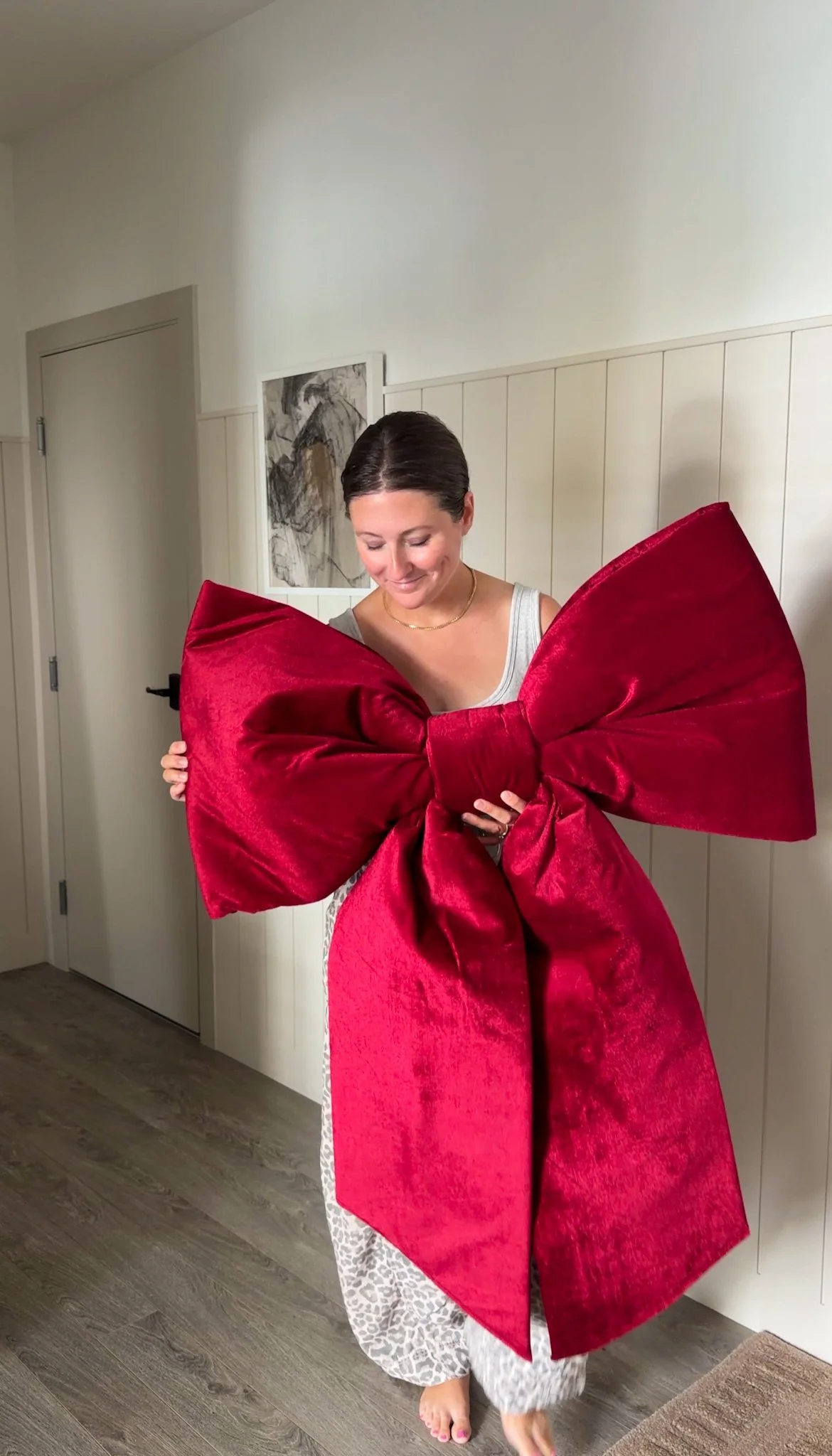 Padded velvet outdoor Christmas bow with wired edges shaped into a full 3D bow