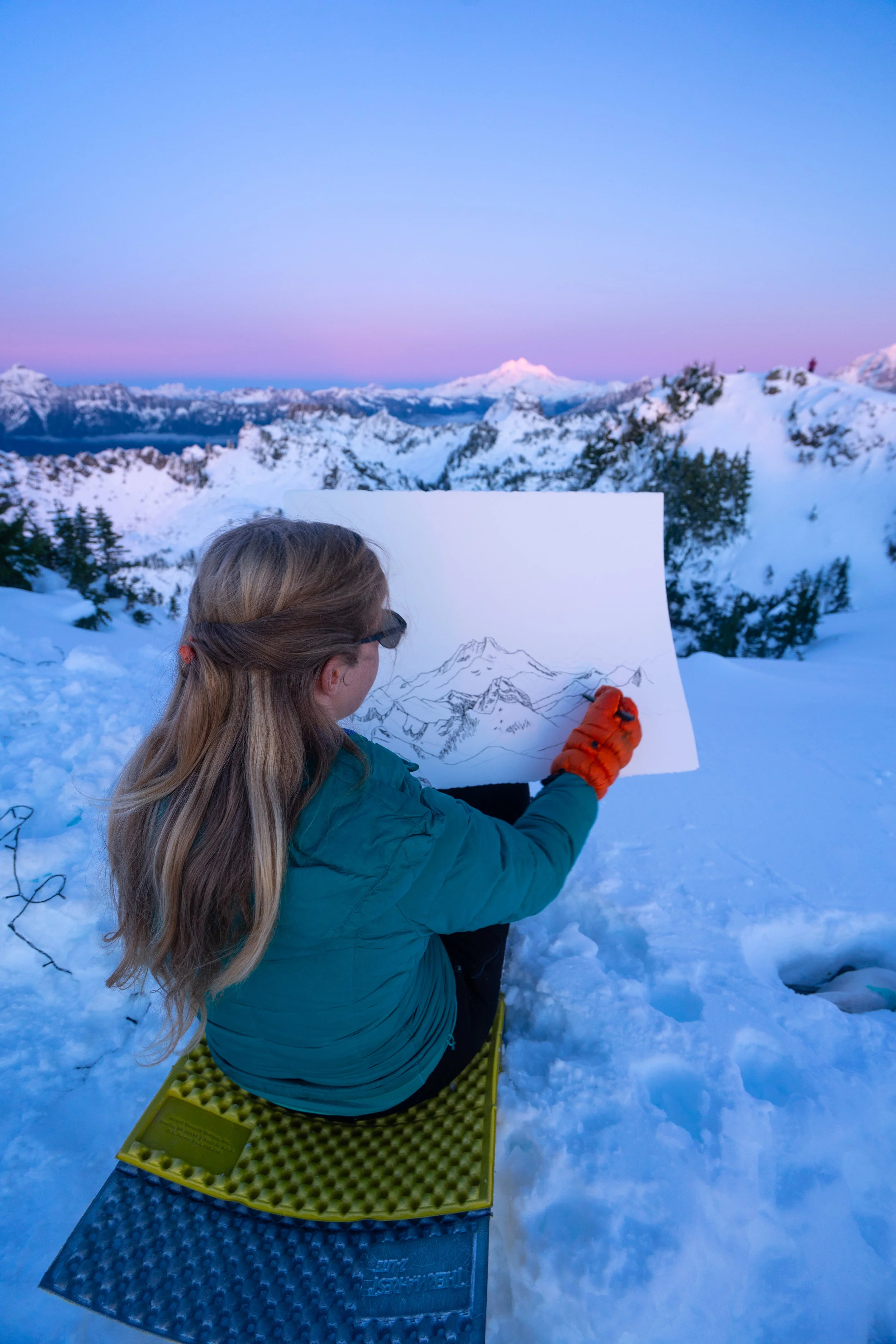 Nikki with the beginning of her painting of Glacier Peak during the sunset!