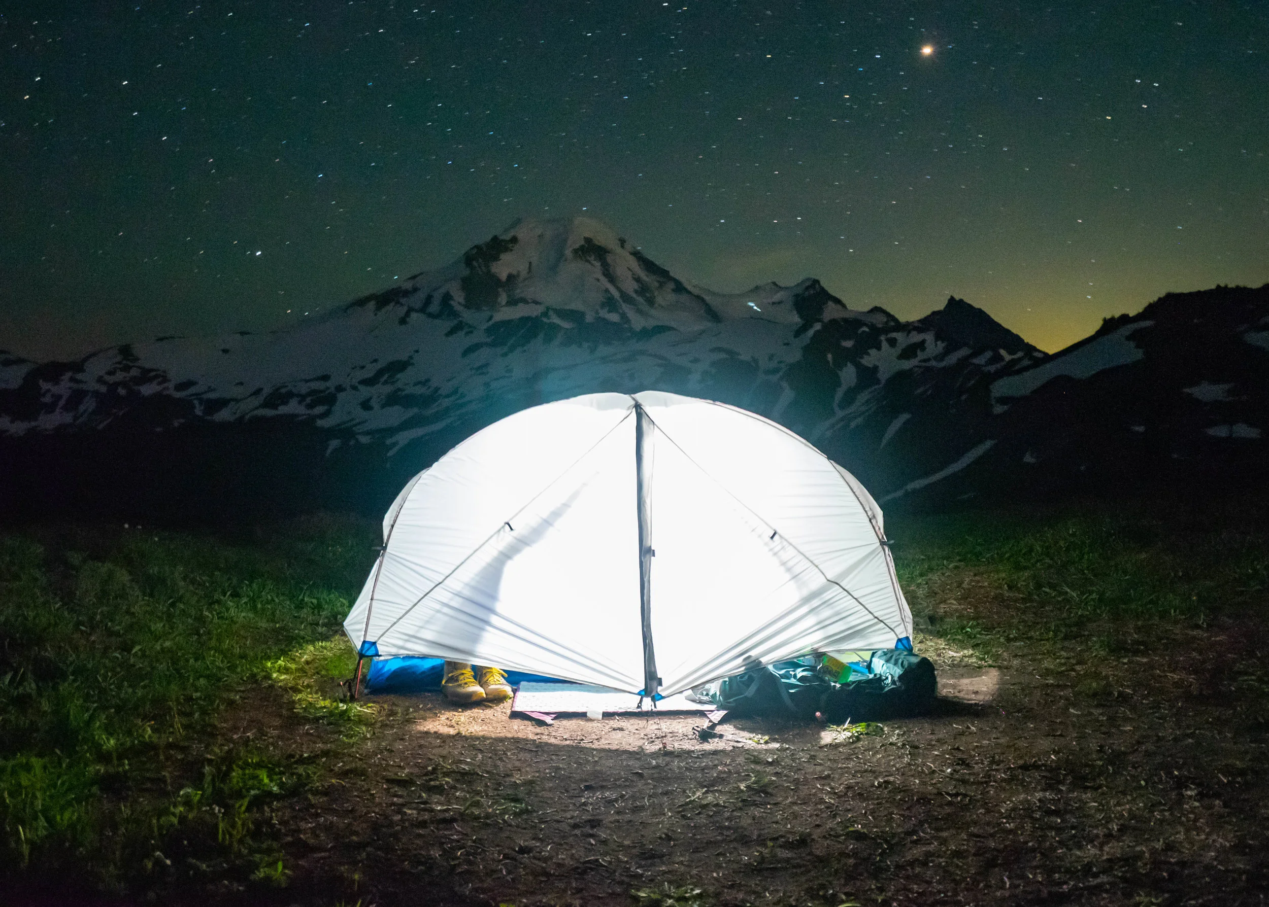If you look closely you can see the headlamps of climbers on the right side of Mount Baker.