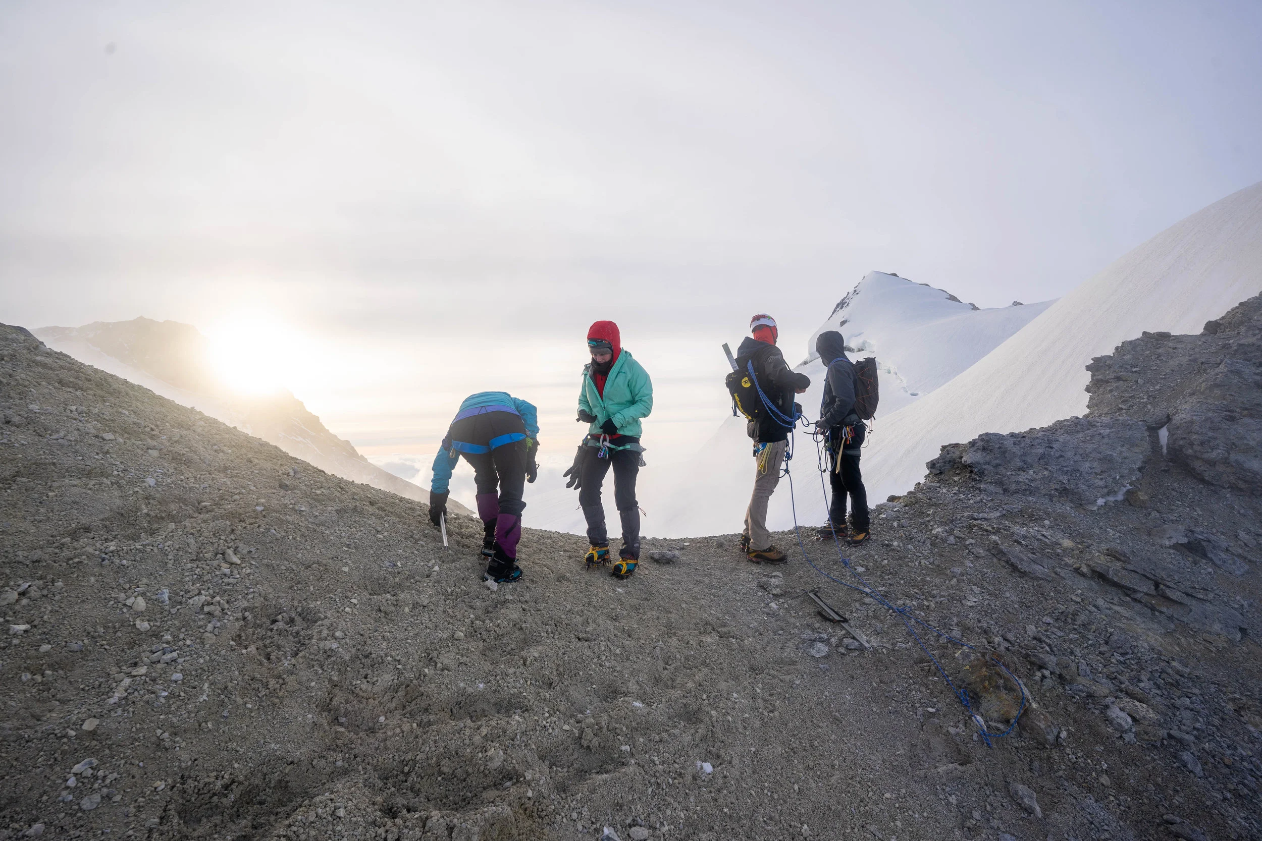 Our team looking into the crater at sunrise.