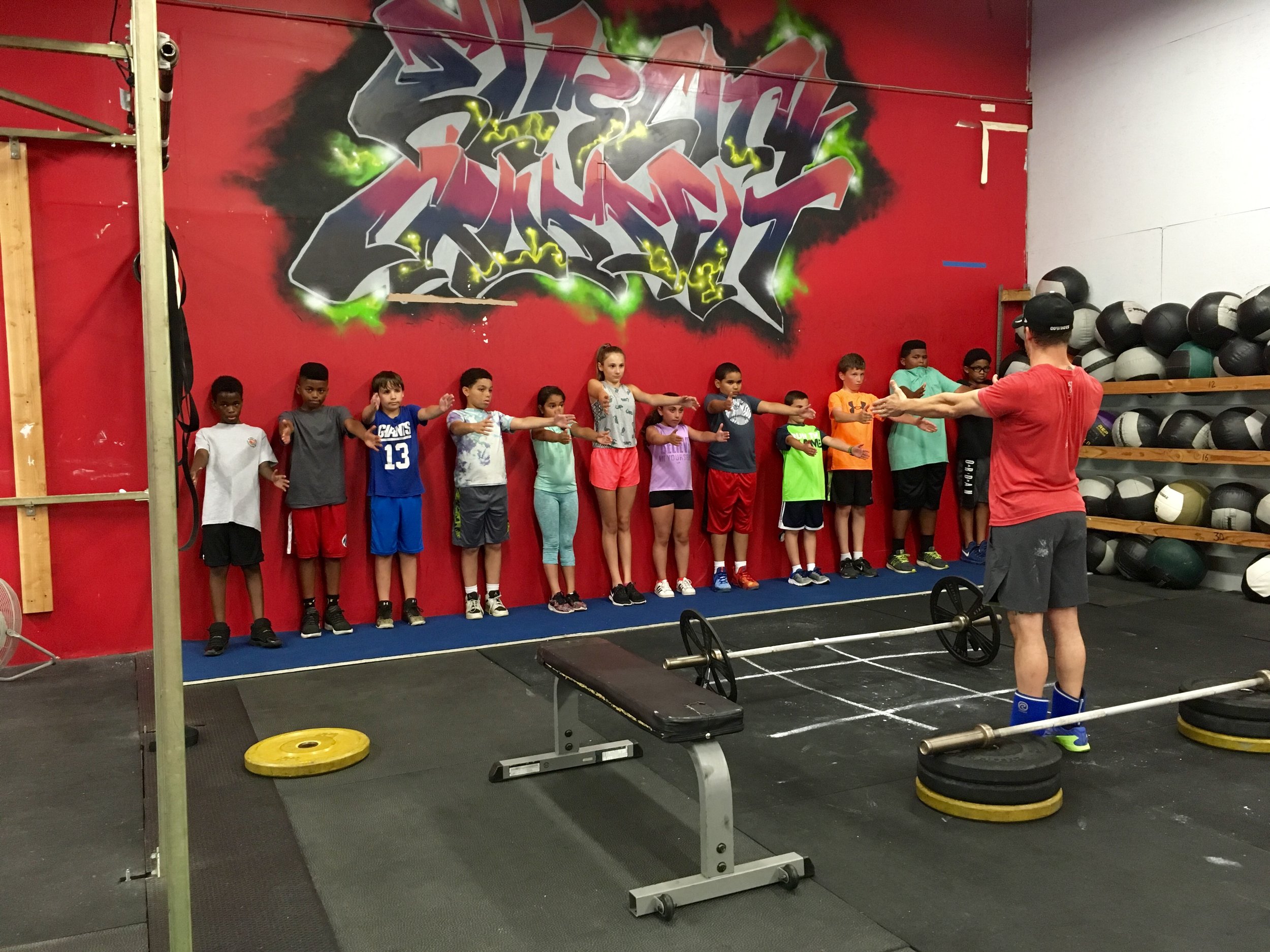 Hamden Kids getting a proper education on Bench Press mechanics from Coach Bobby