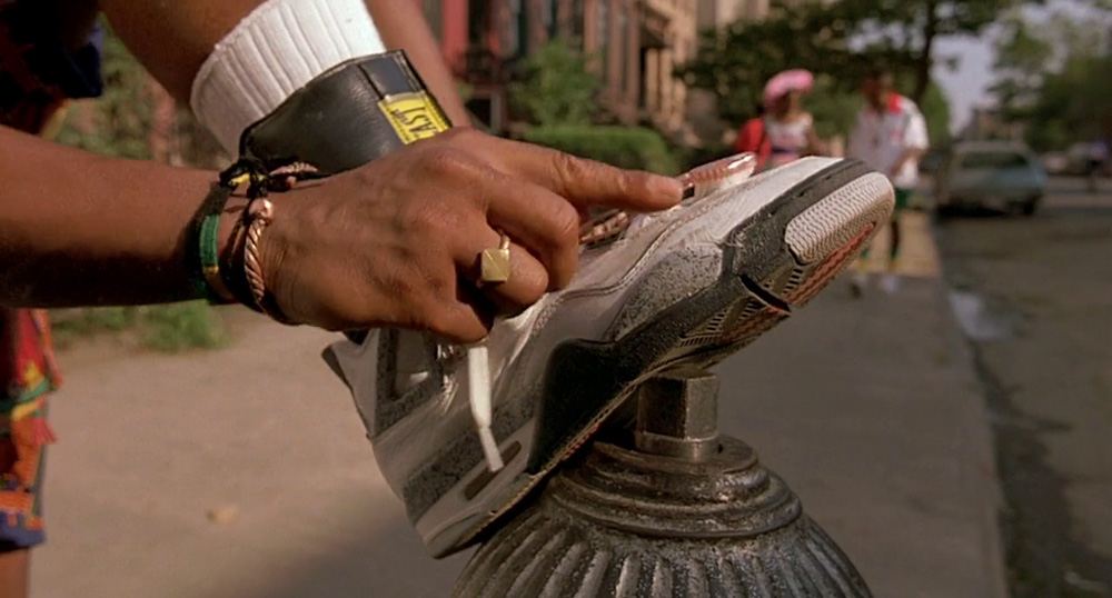 Do the Right Thing - A Spike Lee Join t (1989). The character cleans his shoes with a toothbrush after they have been scuffed.