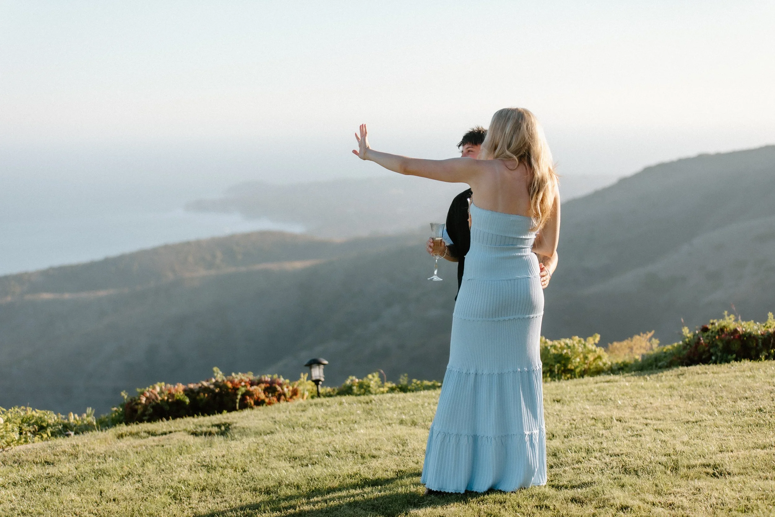 Couple admiring engagement ring after proposal