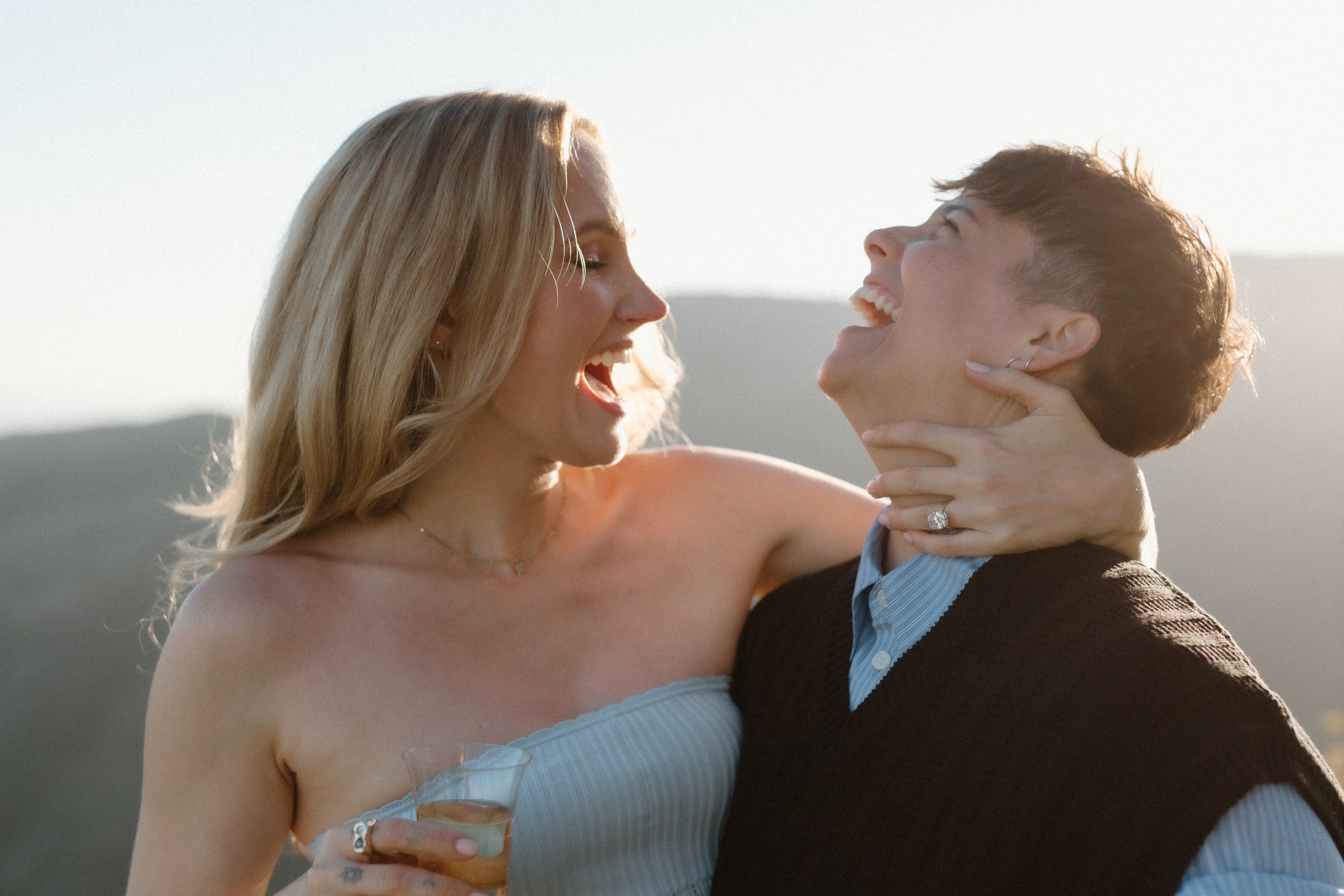 Elated couple sips champagne and laughs after surprise Malibu marriage proposal 