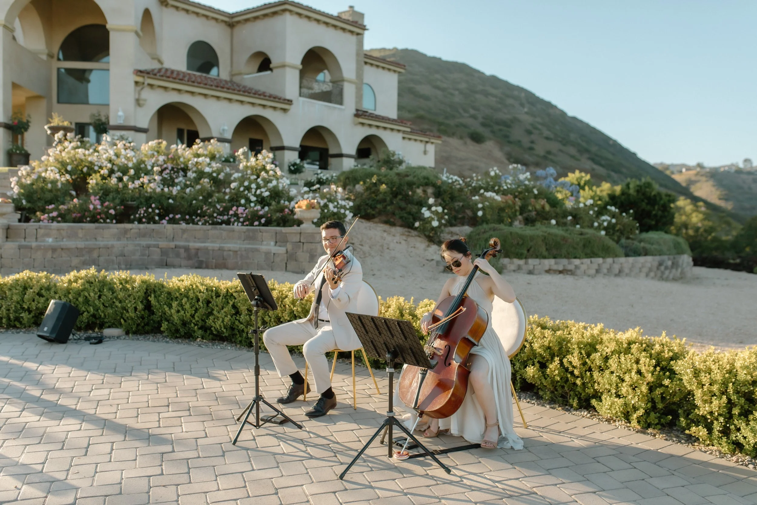 String duo plays love songs at surprise luxury proposal at Grand View Malibu