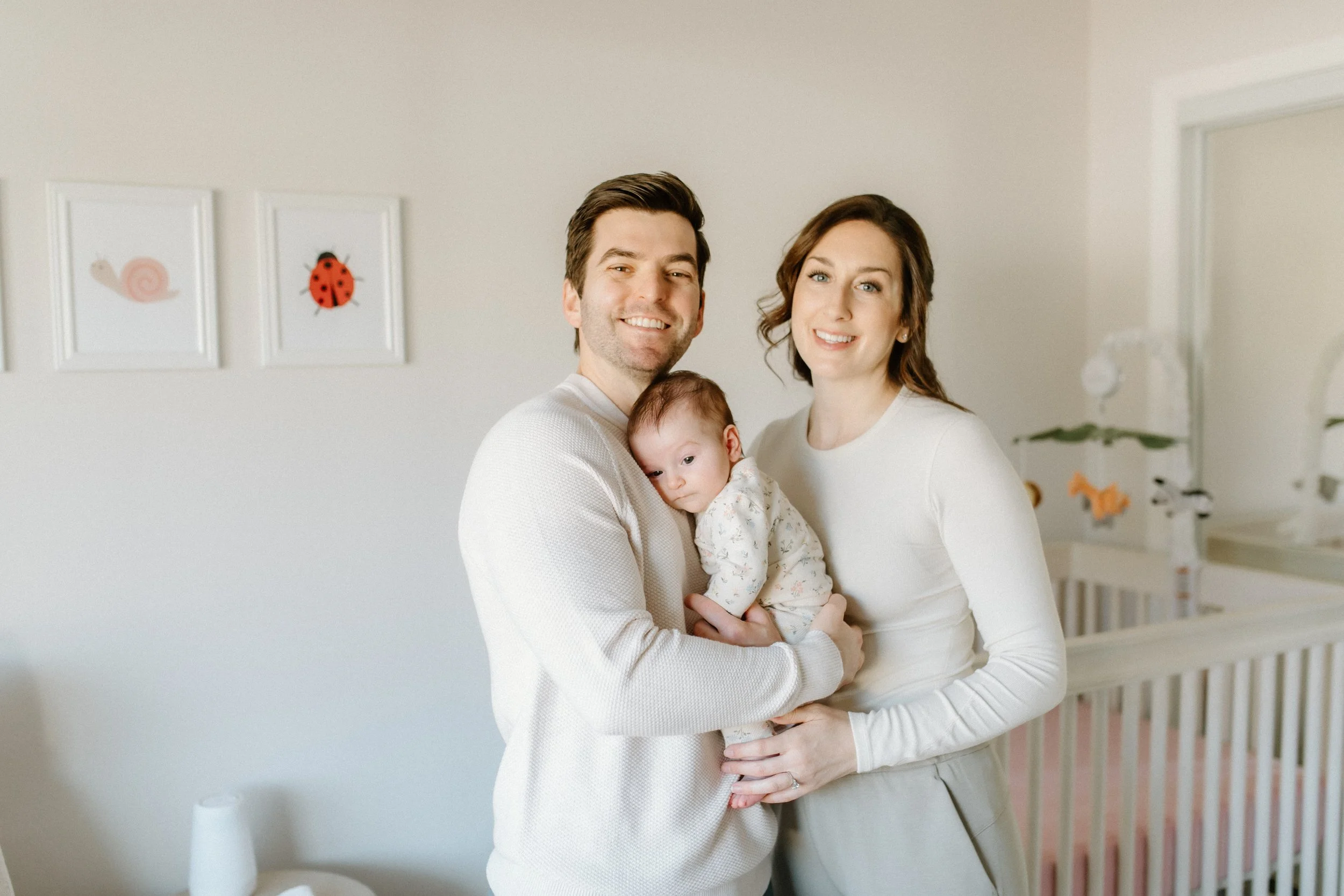 parents at home with a new baby
