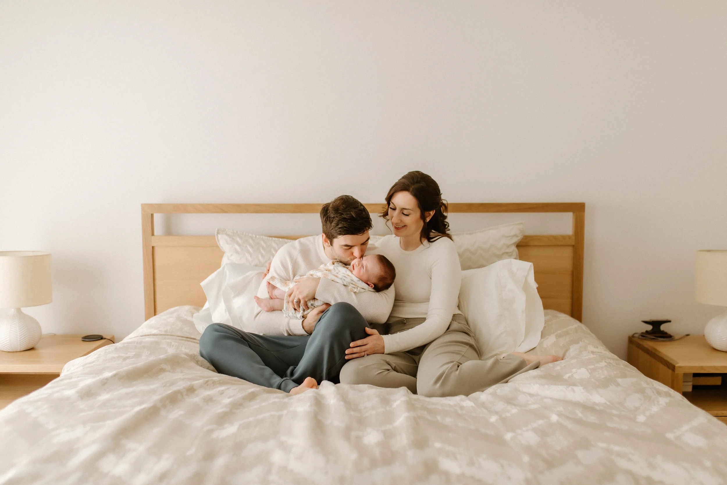 new parents at home with baby