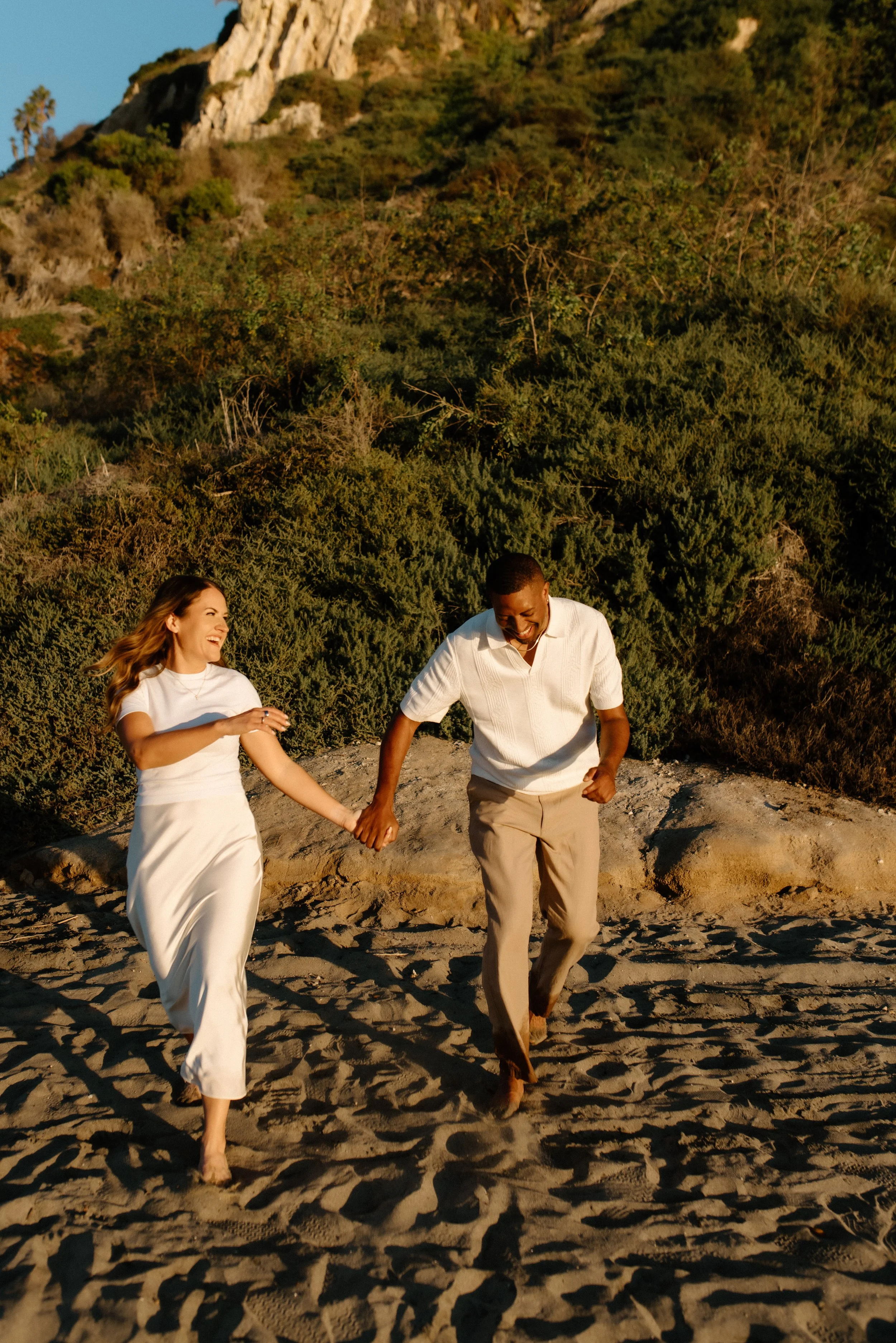 fun engagement session on the beach