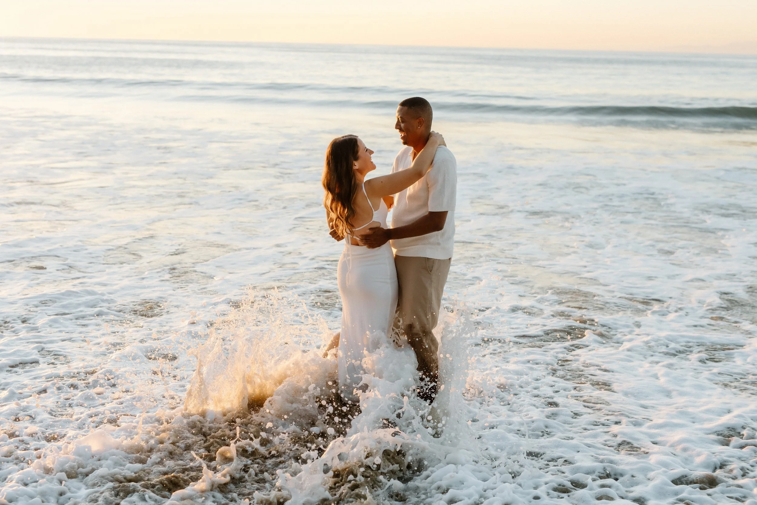 Engagement session in the ocean waves