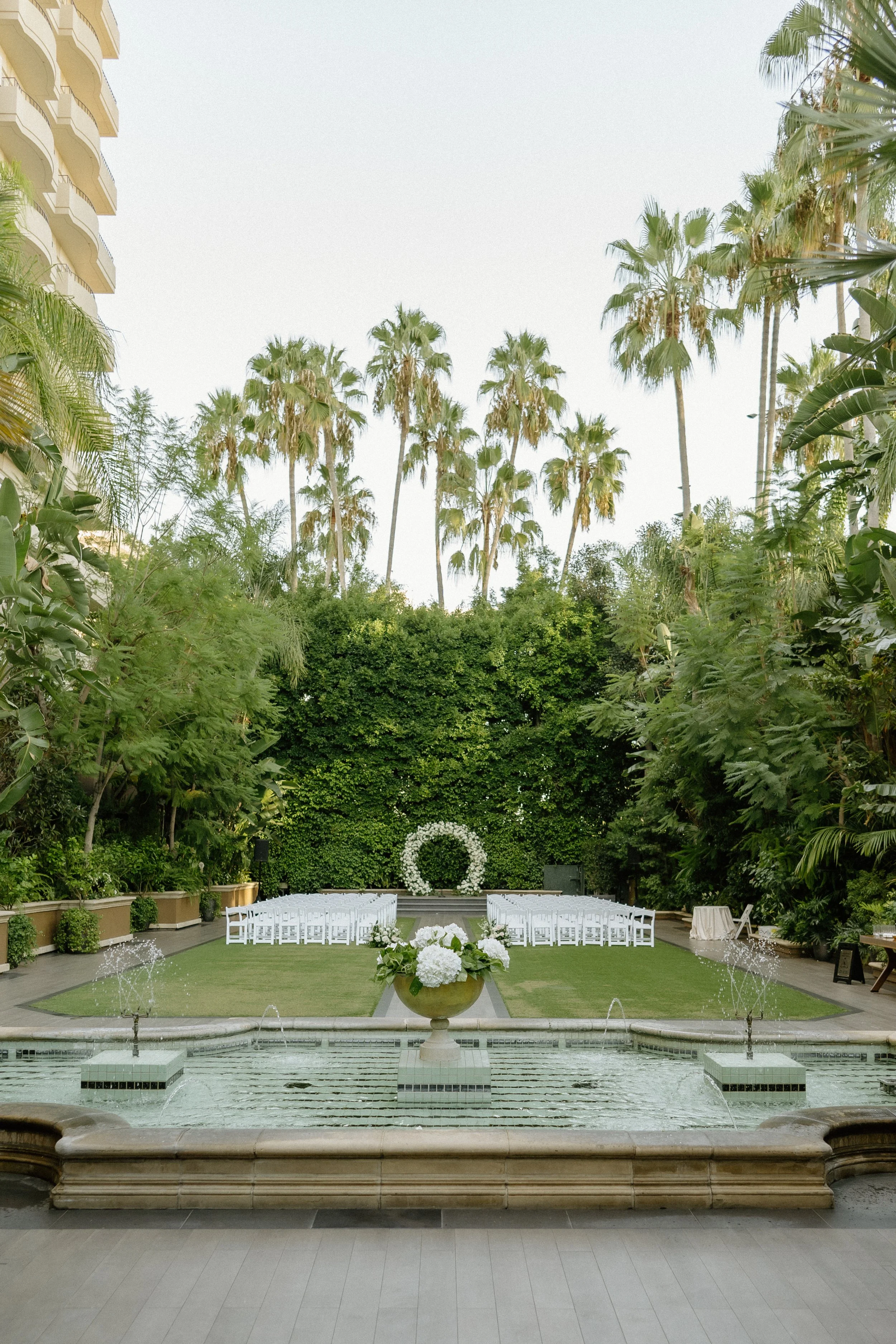 Garden Ceremony with Circular flower arch at Four Seasons Hotel Los Angeles at Beverly Hills