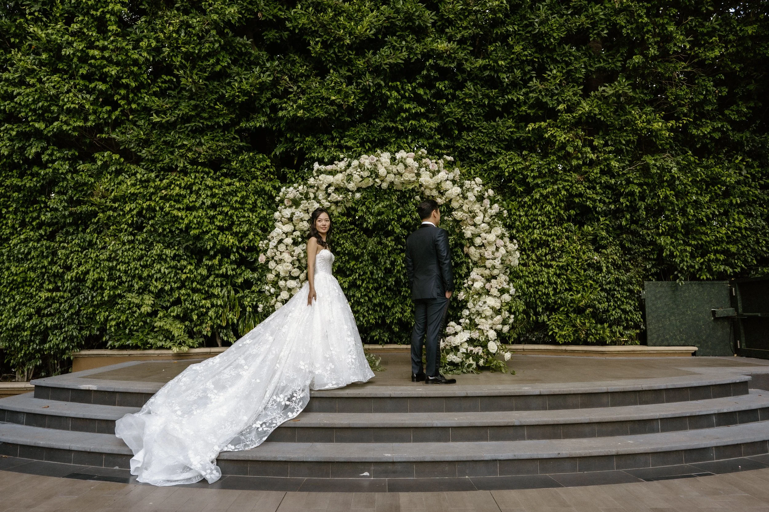 Bride approaching the groom during the first look moment