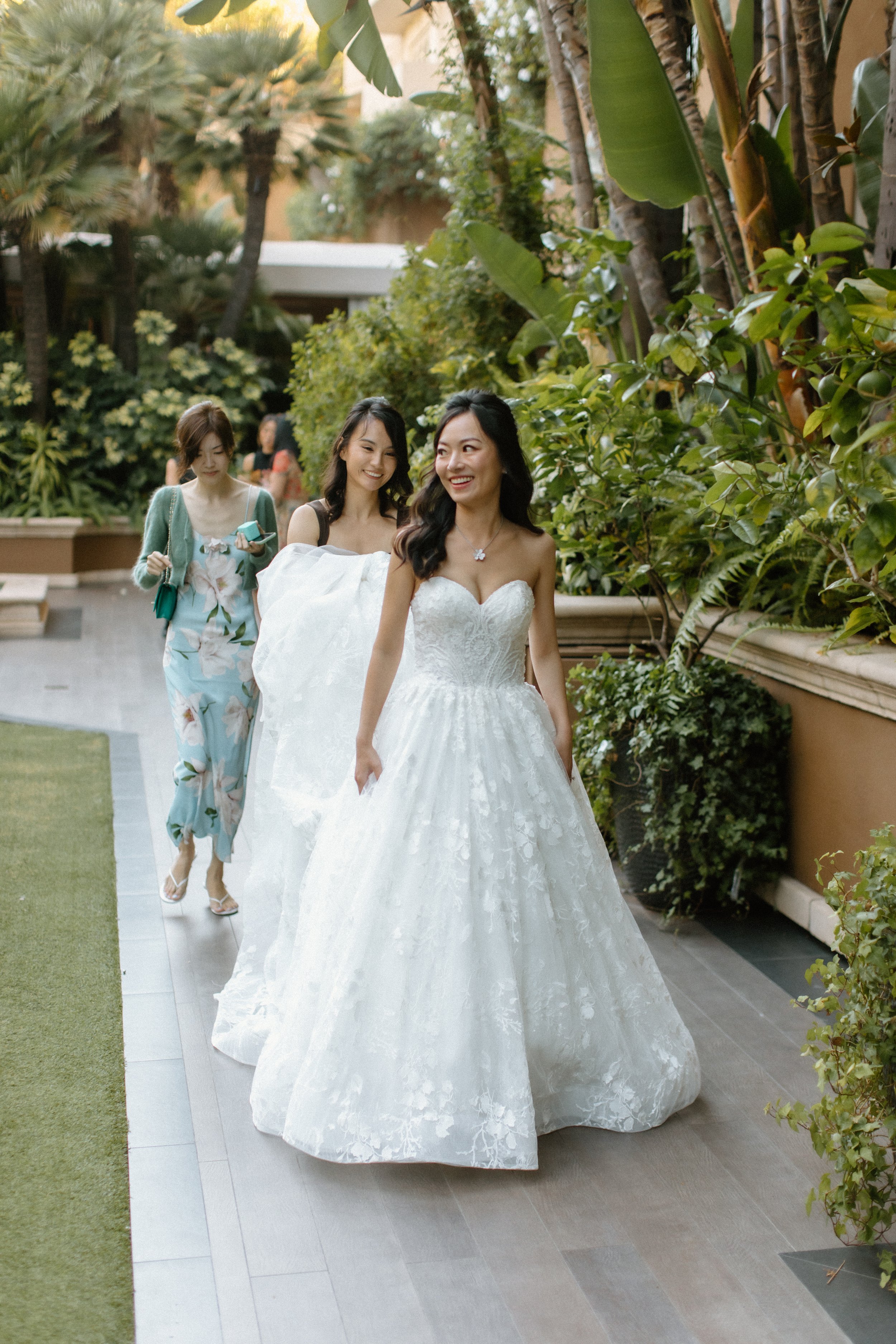 Bride walking to first look where she and the groom will see each other for the first time before the ceremony begins